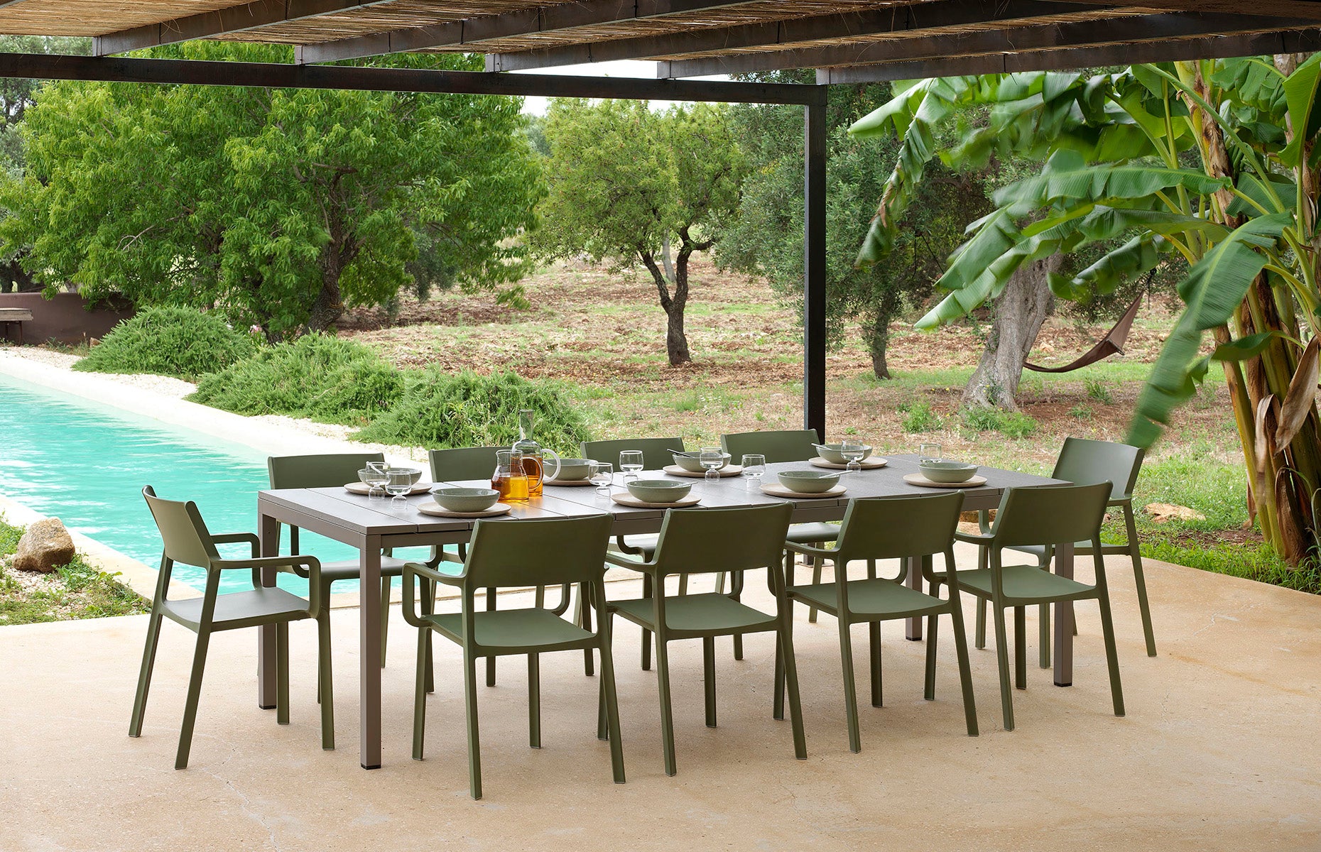 Outdoor chair with armrests TRILL in teal blue