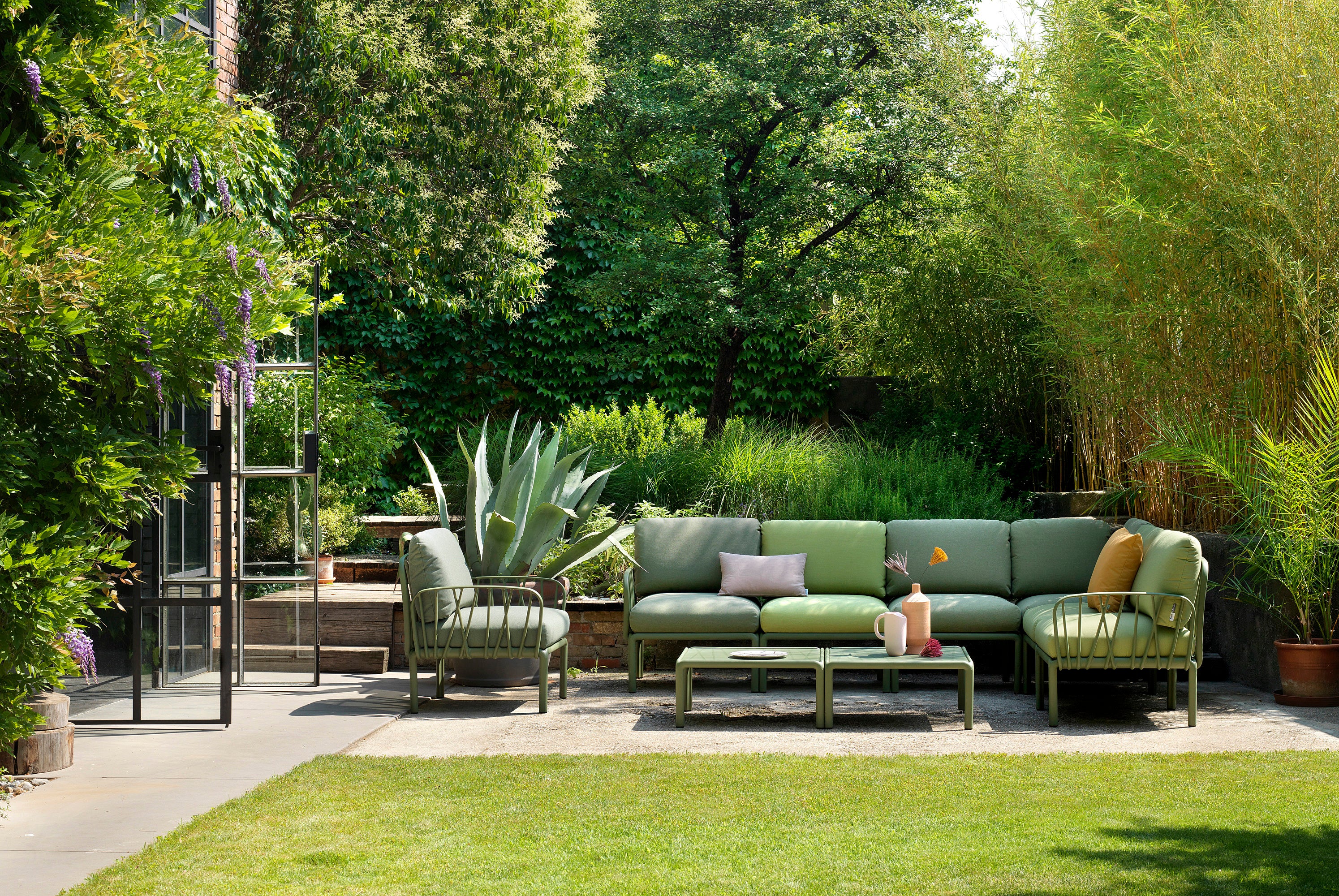 Outdoor Armchair KOMODO in Sky Blue Sunbrella® with Taupe Base