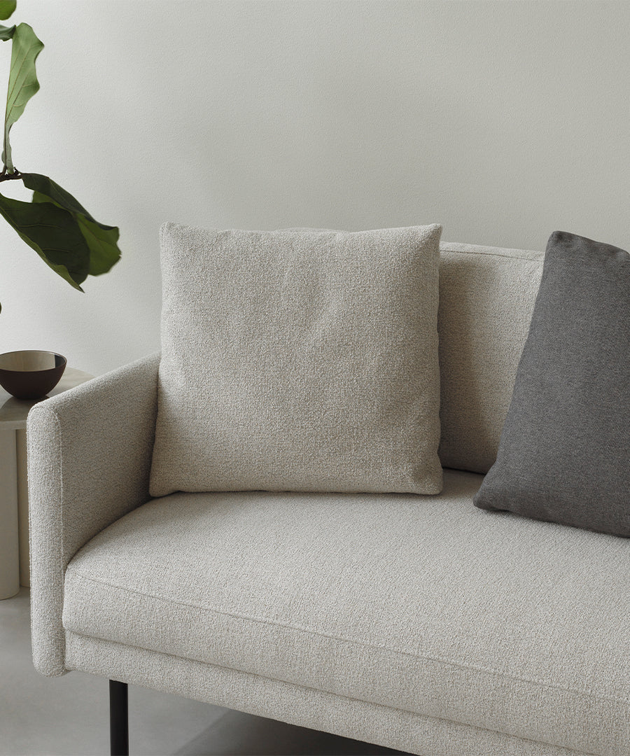 White rar armchair with a black base