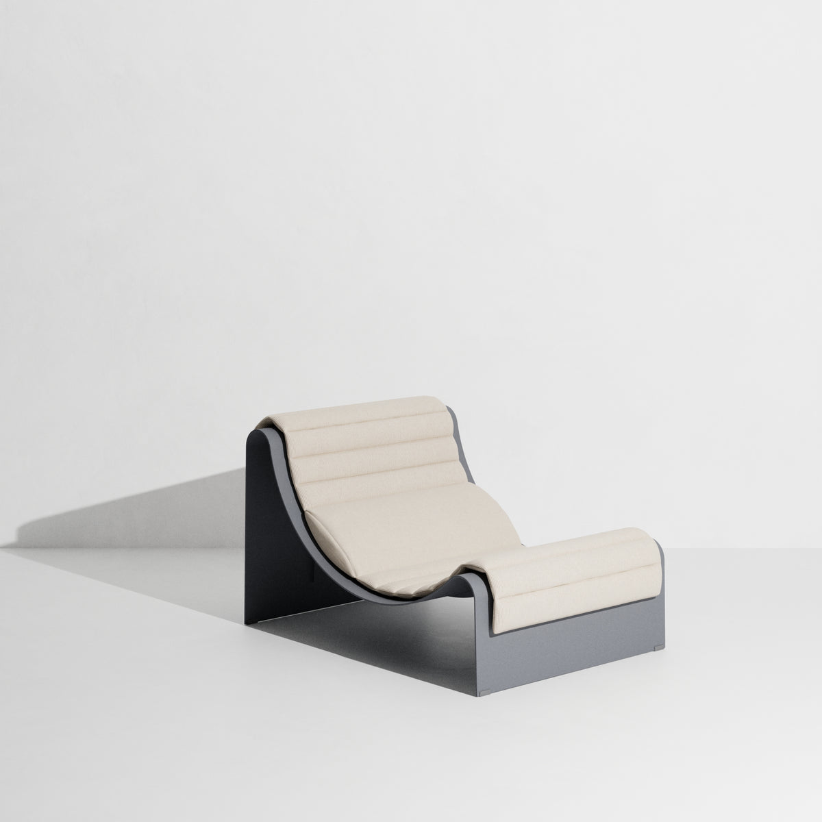 ECLIPSE gray lounge chair with a cream cushion