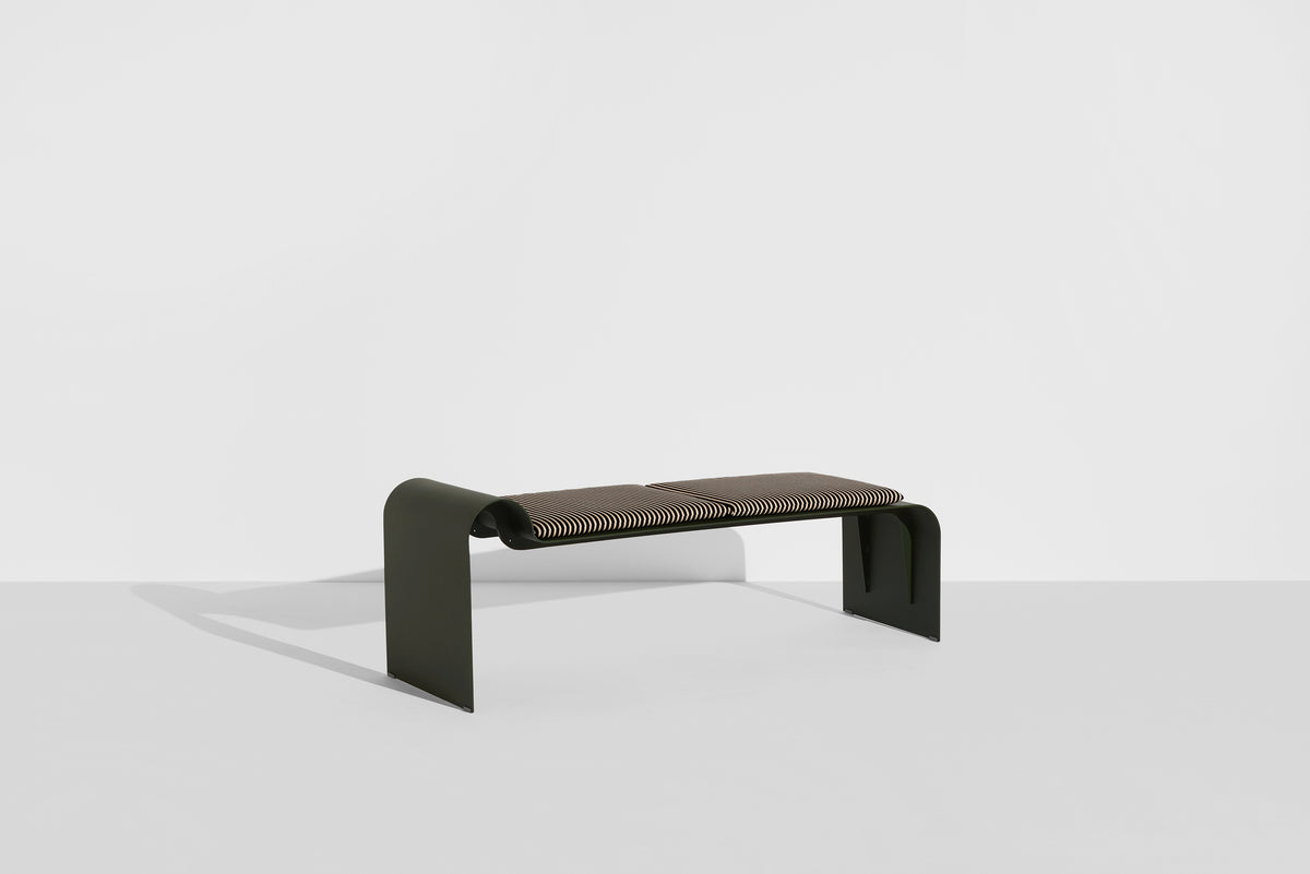 ECLIPSE bench in dark green with a striped cushion