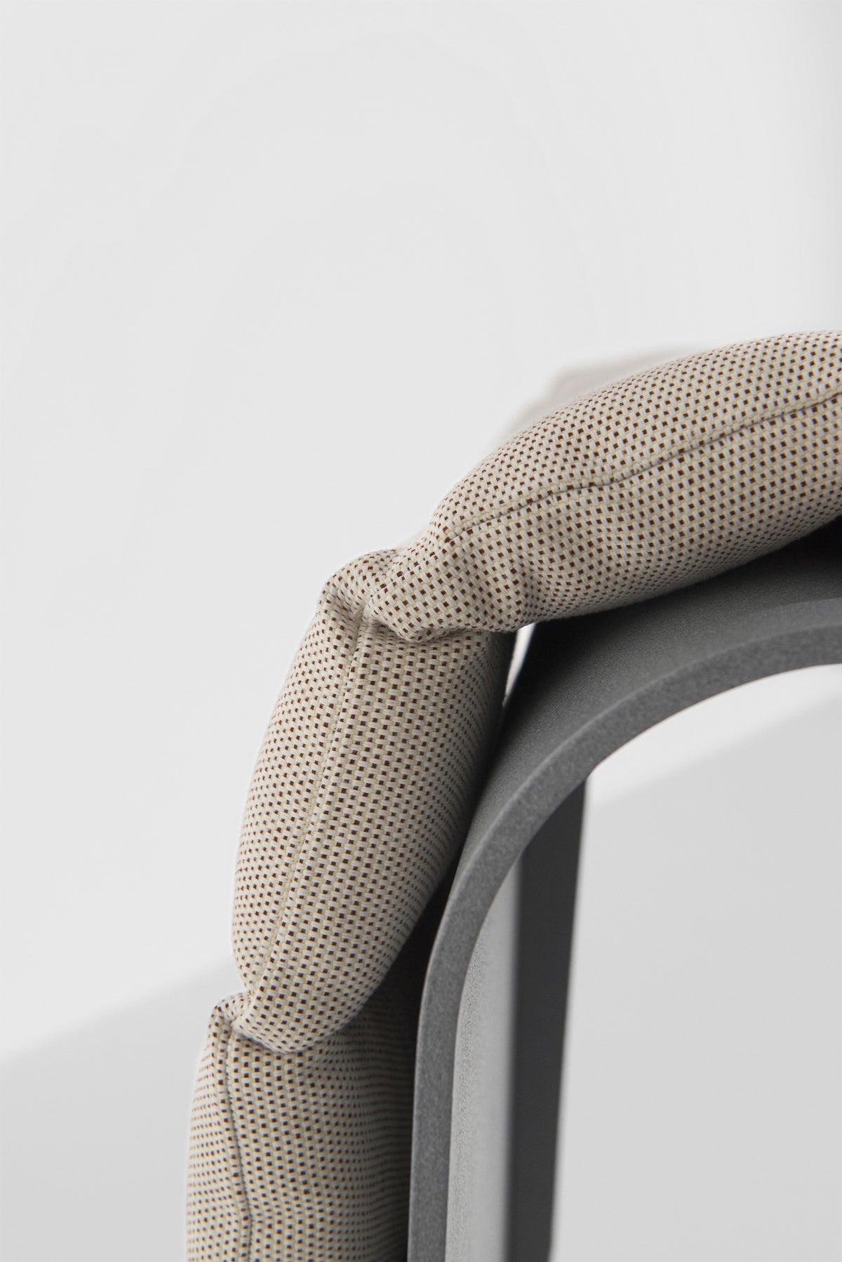 ECLIPSE gray lounge chair with a cream cushion