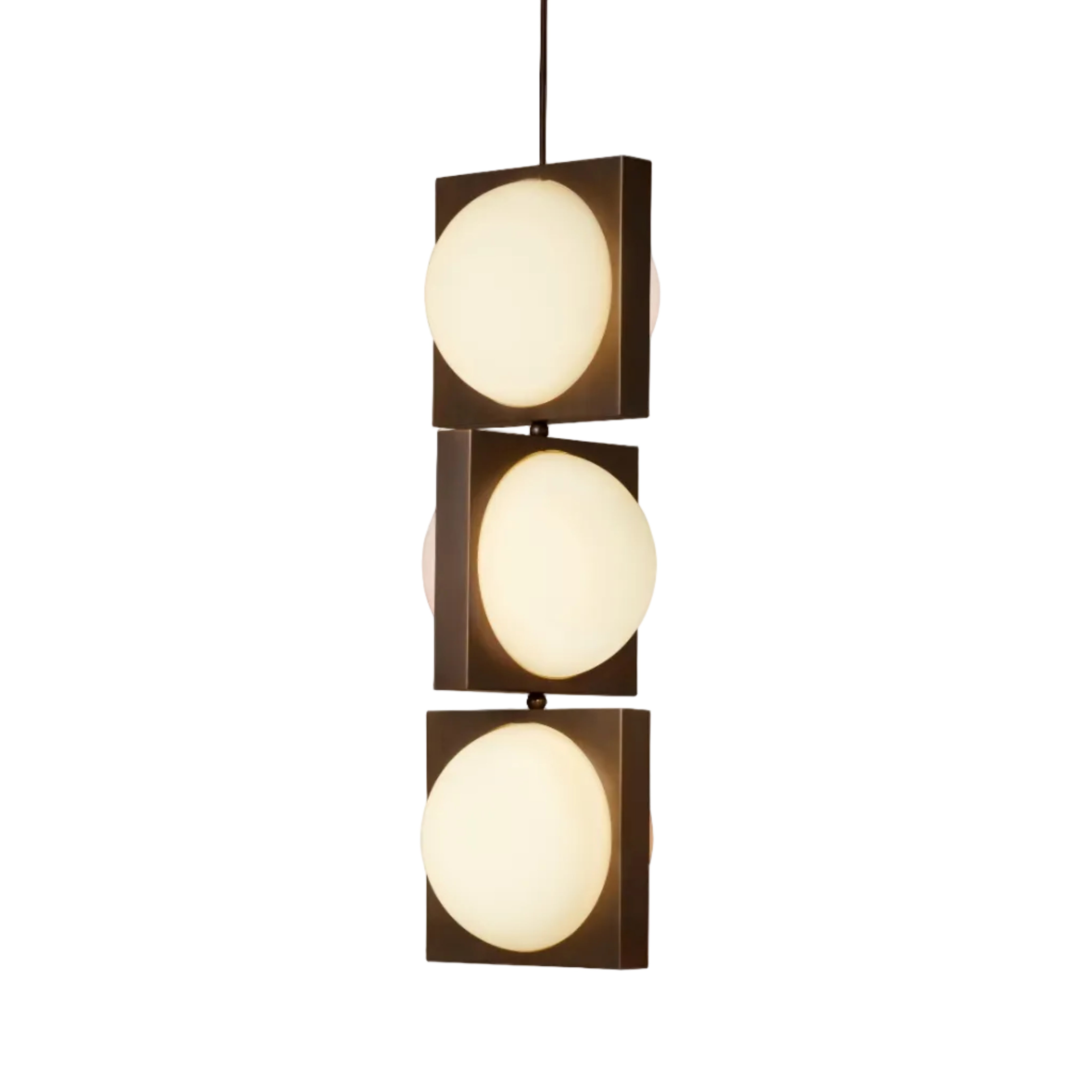 SOLSTICE TRIO pendant lamp with an opal shade and blackened brass.