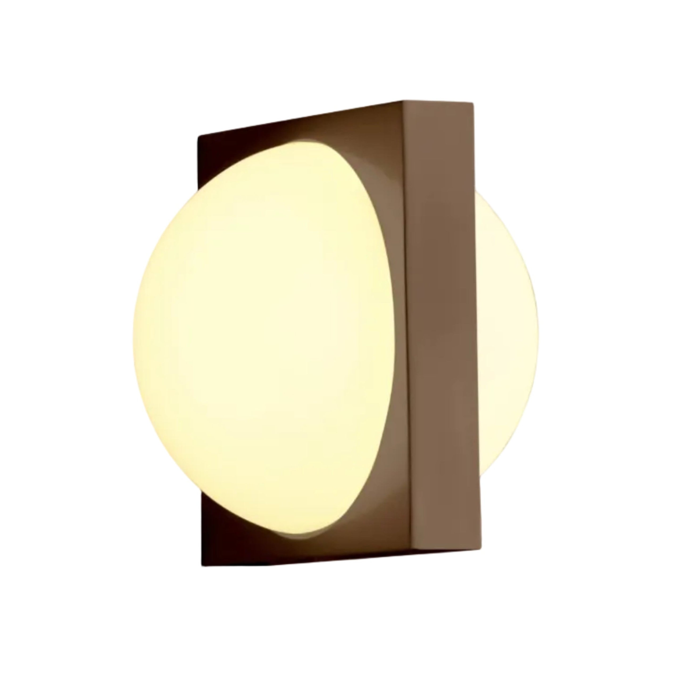 SOLSTICE wall lamp with an opal shade and blackened brass.