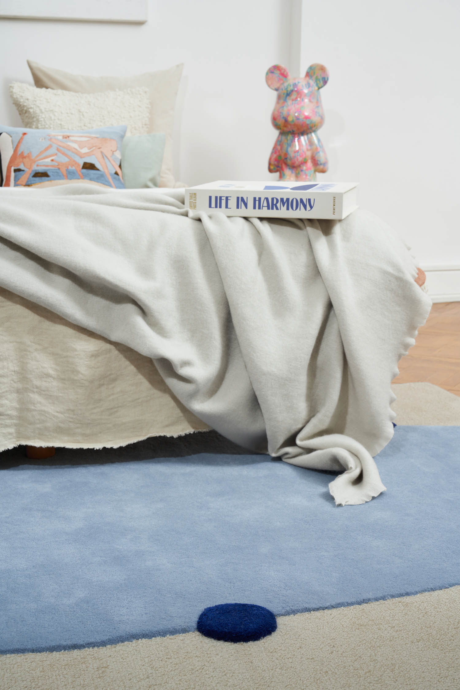 Beige ROME rug with cobalt and blue accents