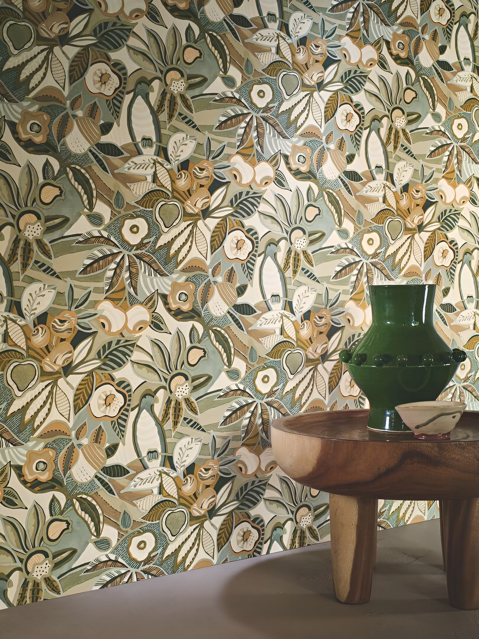 Structural wallpaper with a plant motif of leaves and flowers TEHUANA - CÉLADON/AMANDE mint green with almond