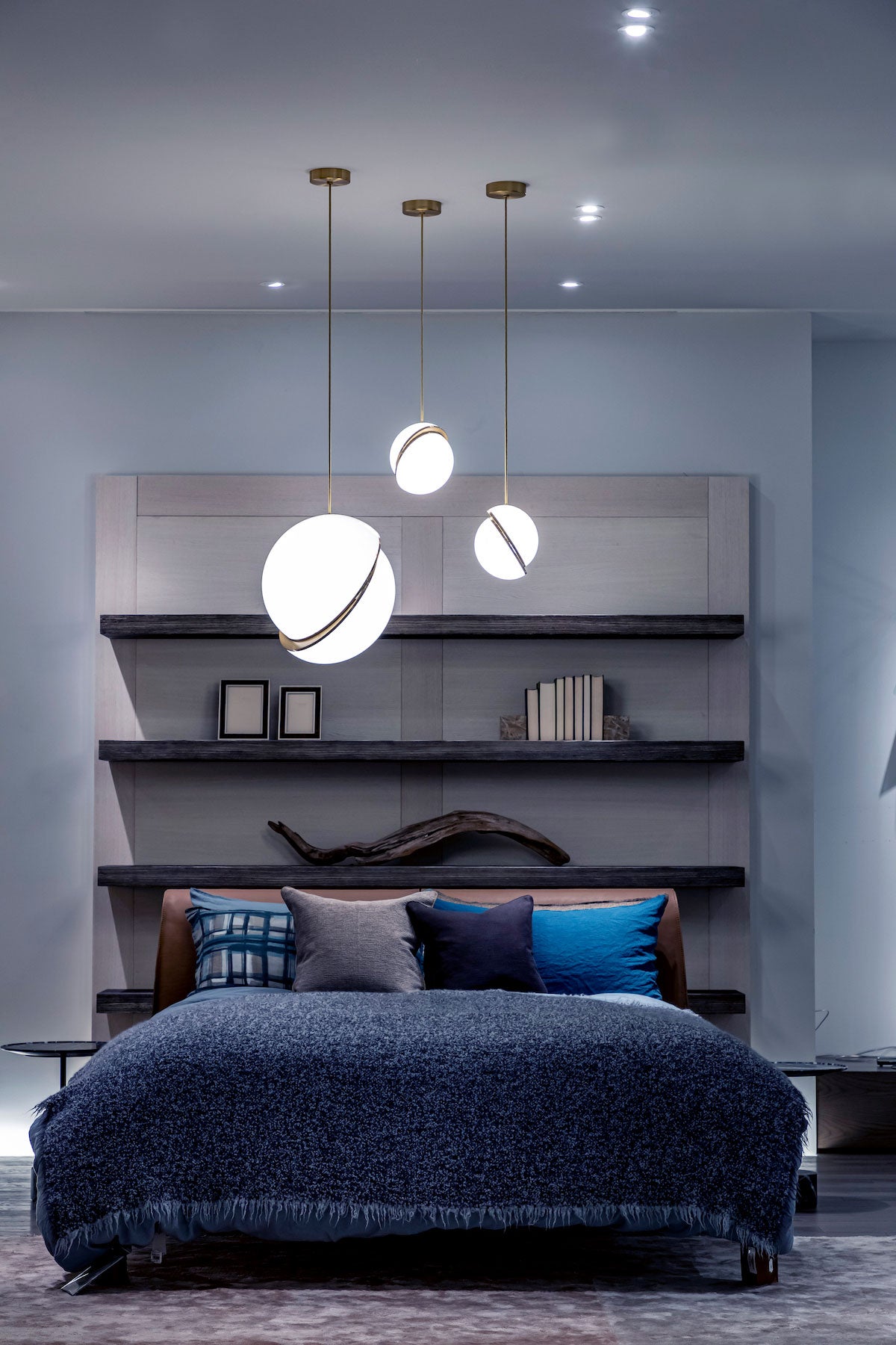 CRESCENT pendant lamp with an opal shade and brass accents.