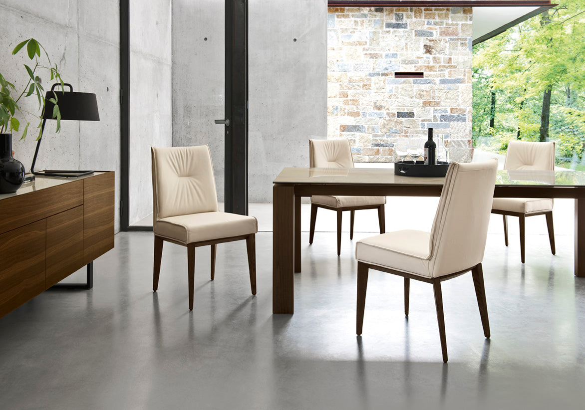 ROMY upholstered chair with a black wooden base