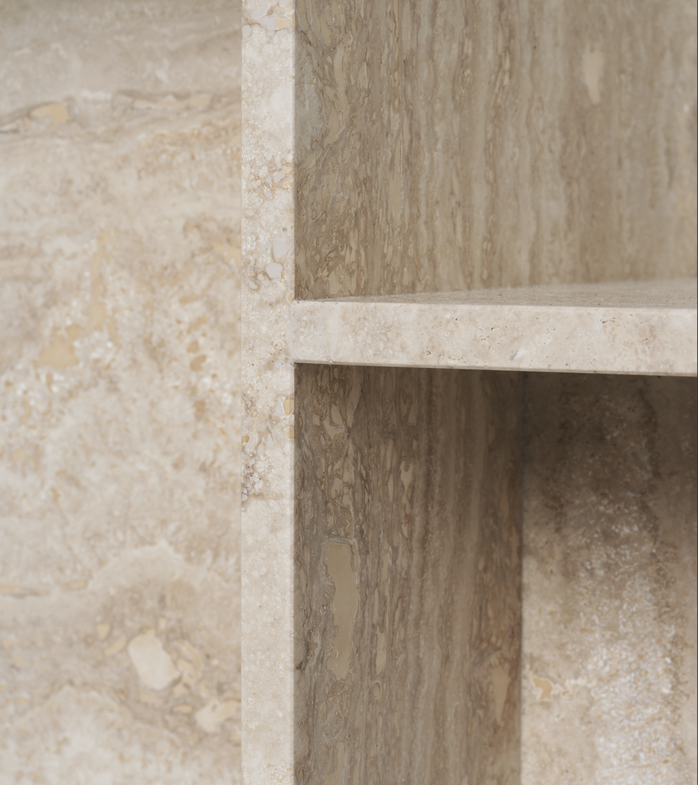 DISTINCT side table in sandy travertine