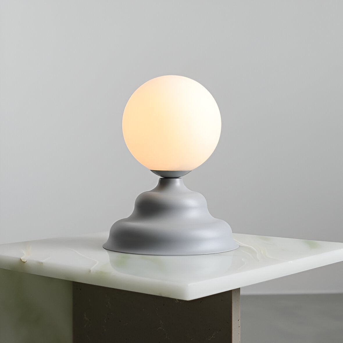 Table lamp with a glass lampshade gray wave