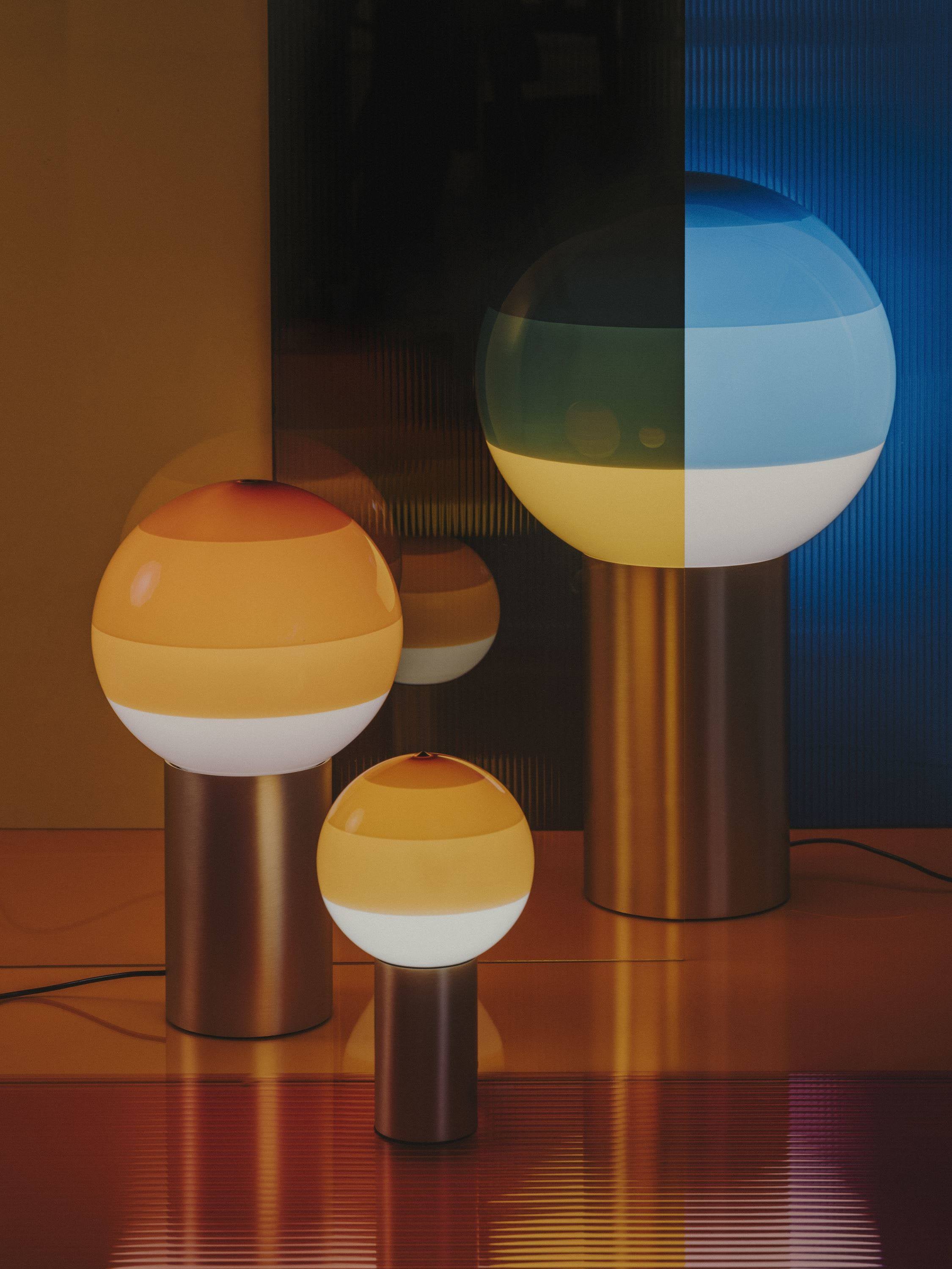 DIPPING amber table lamp with a gold base