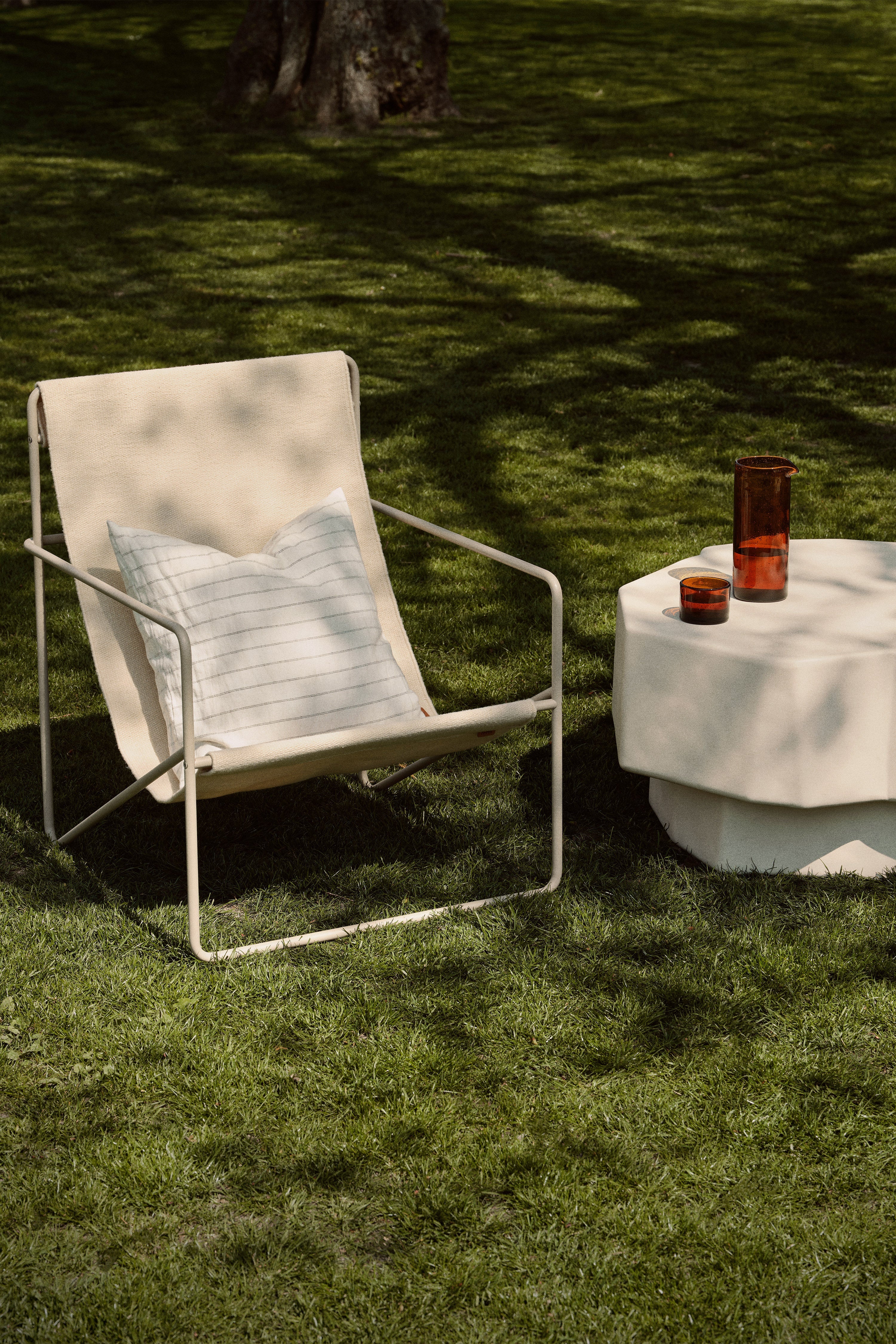 Desert beige garden chair with a beige base
