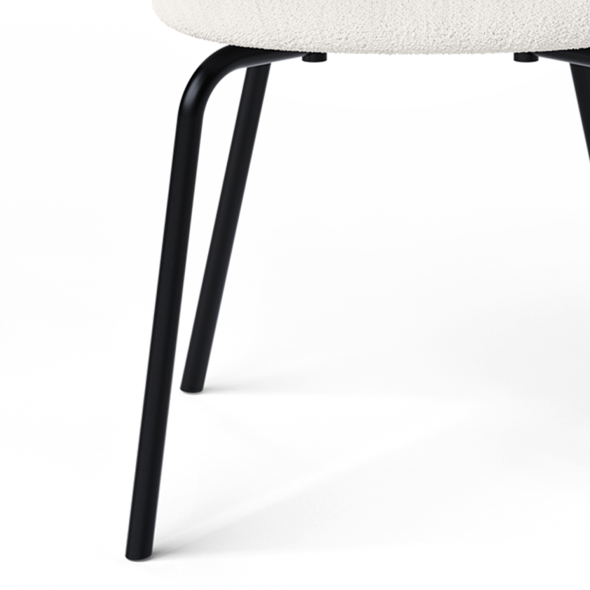 Rico Bouclé chair broken white with a black base