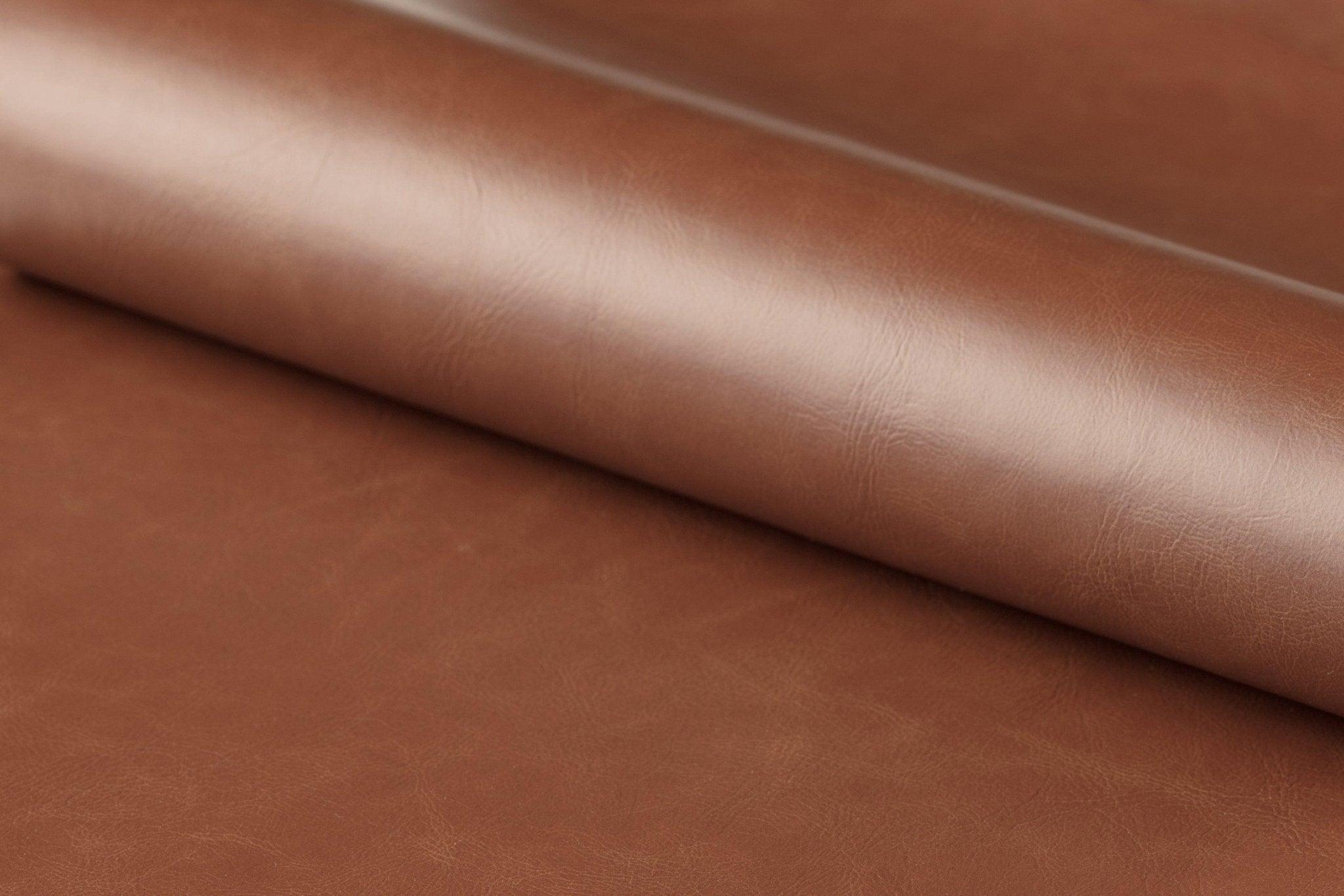 Krzesło biurowe NIKLAS brandy ekoskóra z czarną podstawą Actona Eye on Design