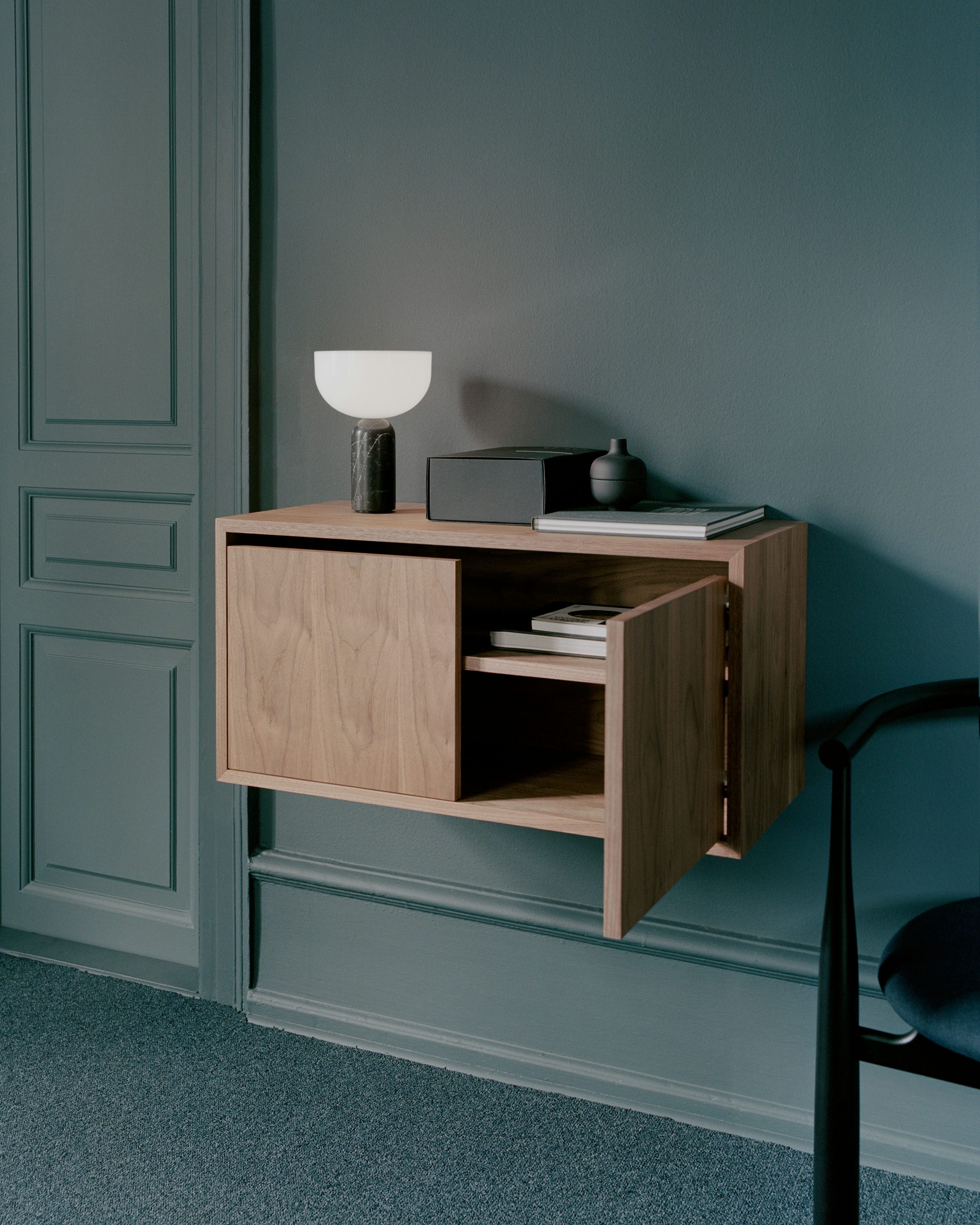 Hanging cabinet with the door of New Works Biały