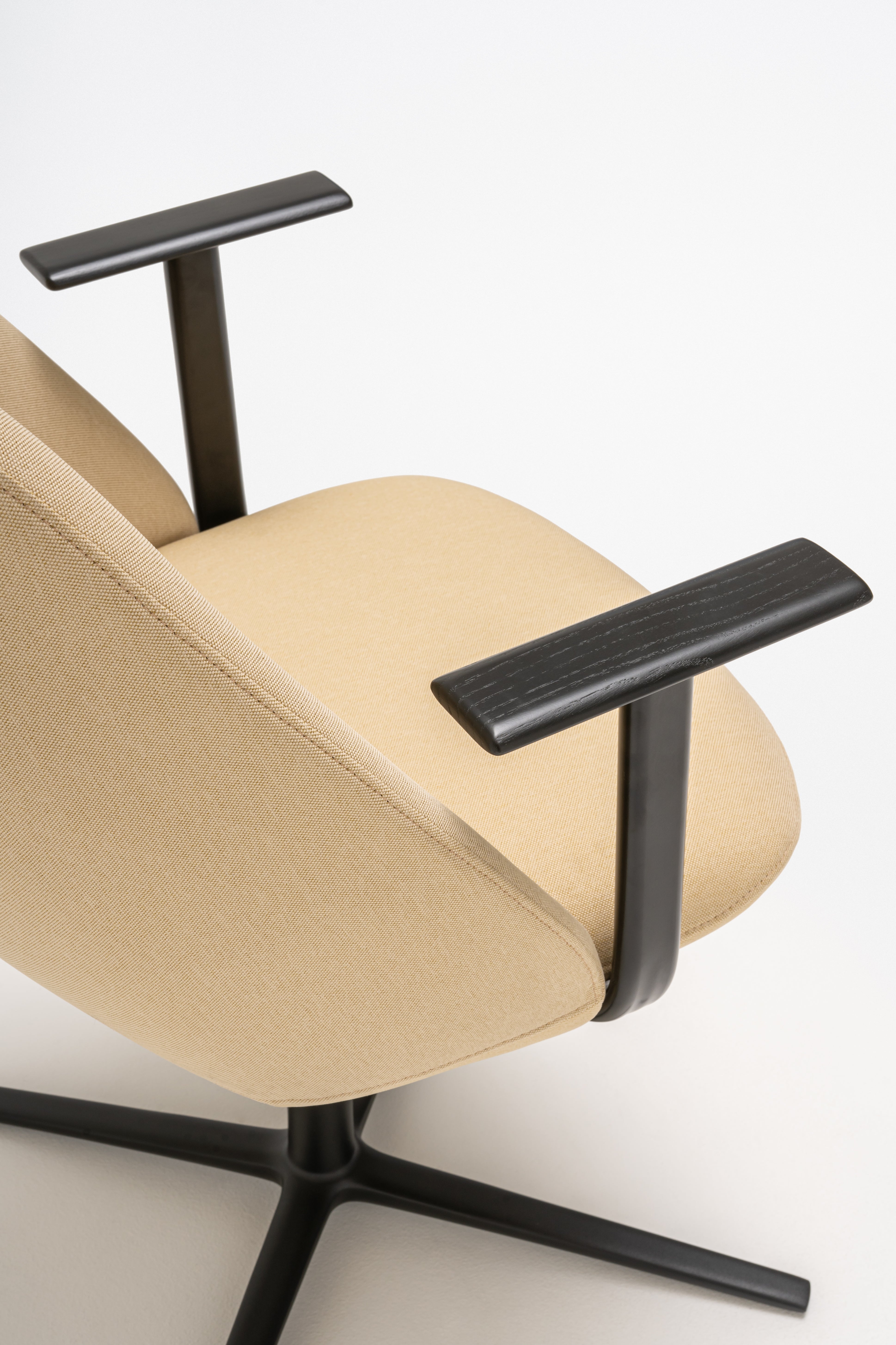 Armchair with a high backrest.