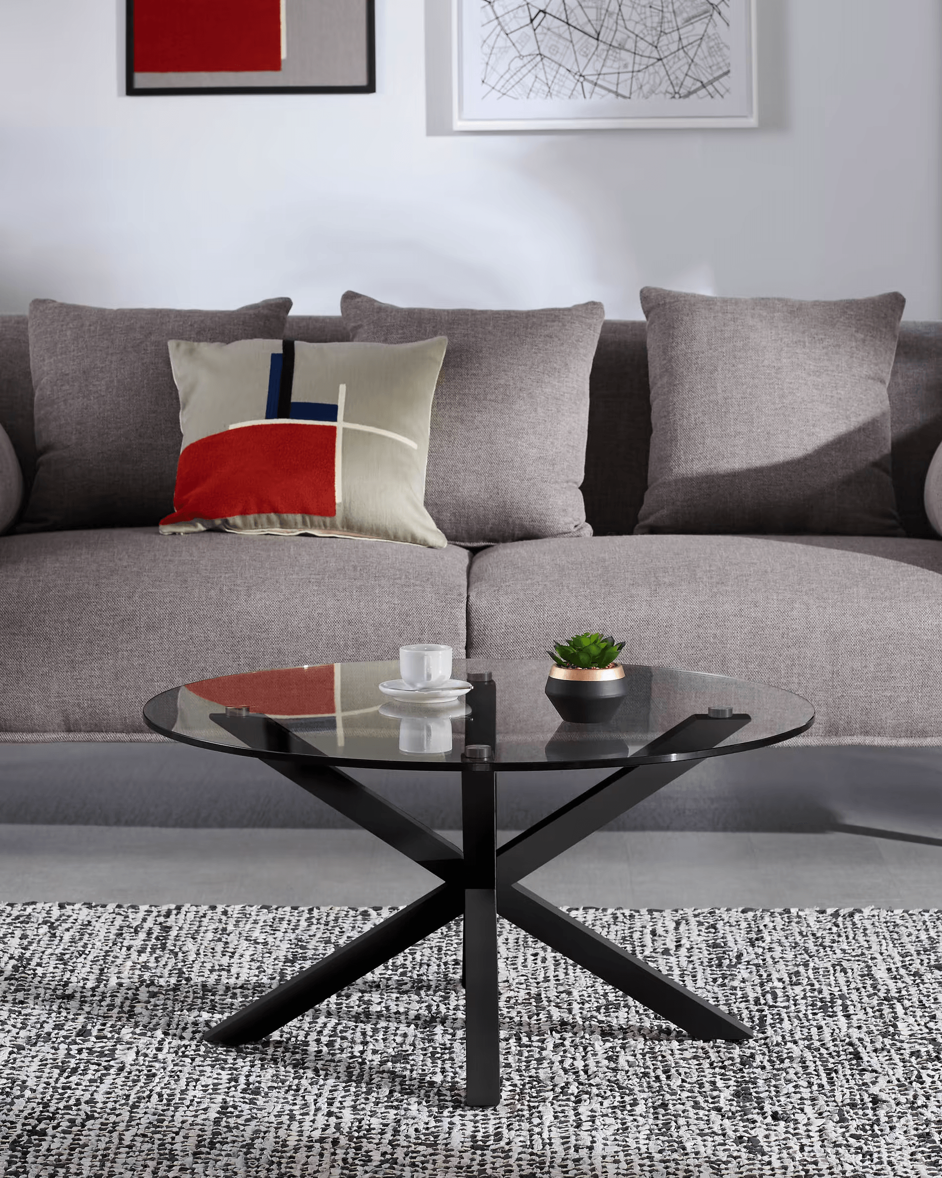 Stolik kawowy okrągły ARGO szklany z czarną podstawą La Forma Eye on Design