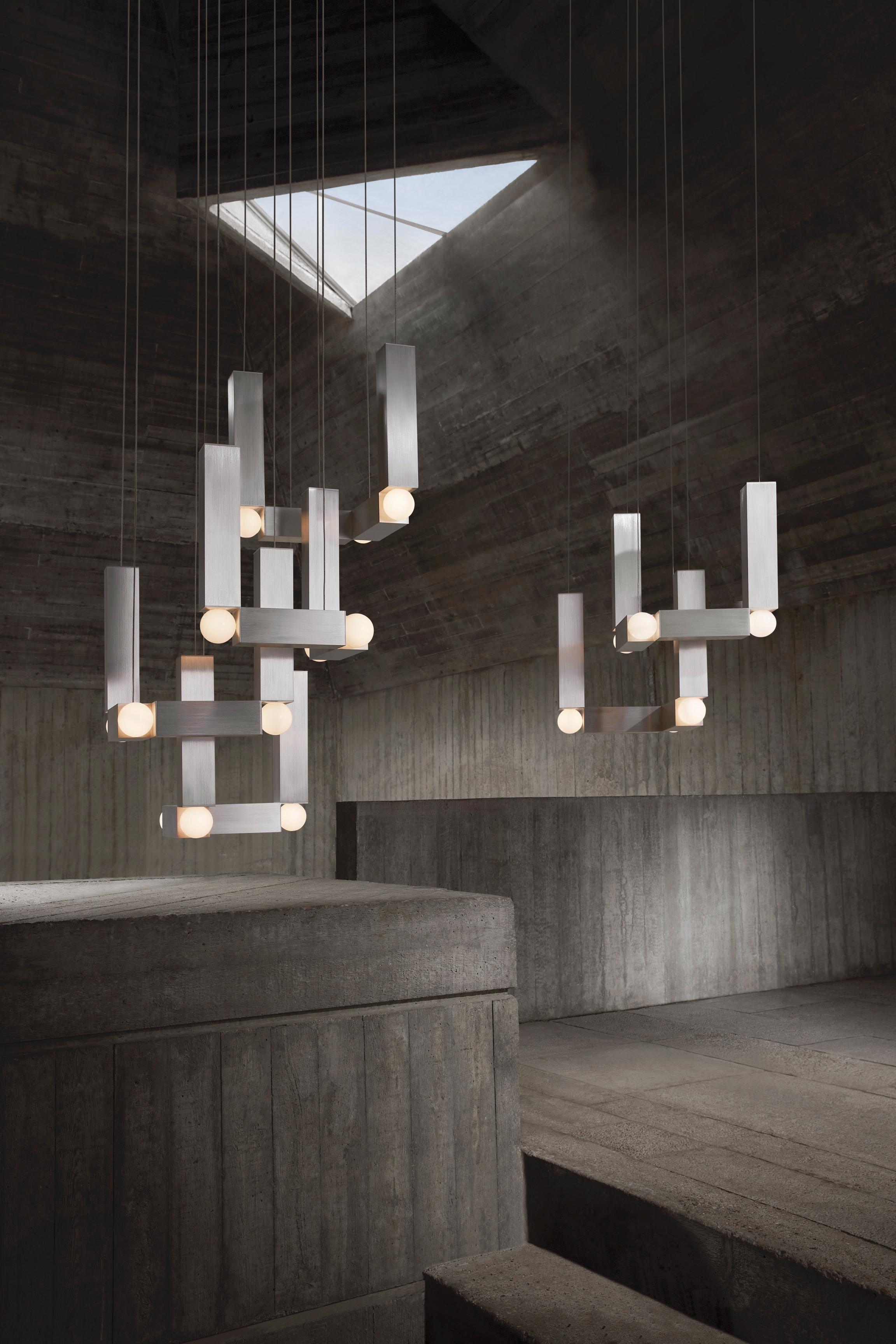 VESPER QUATTRO pendant lamp with an opal shade and silver finish.