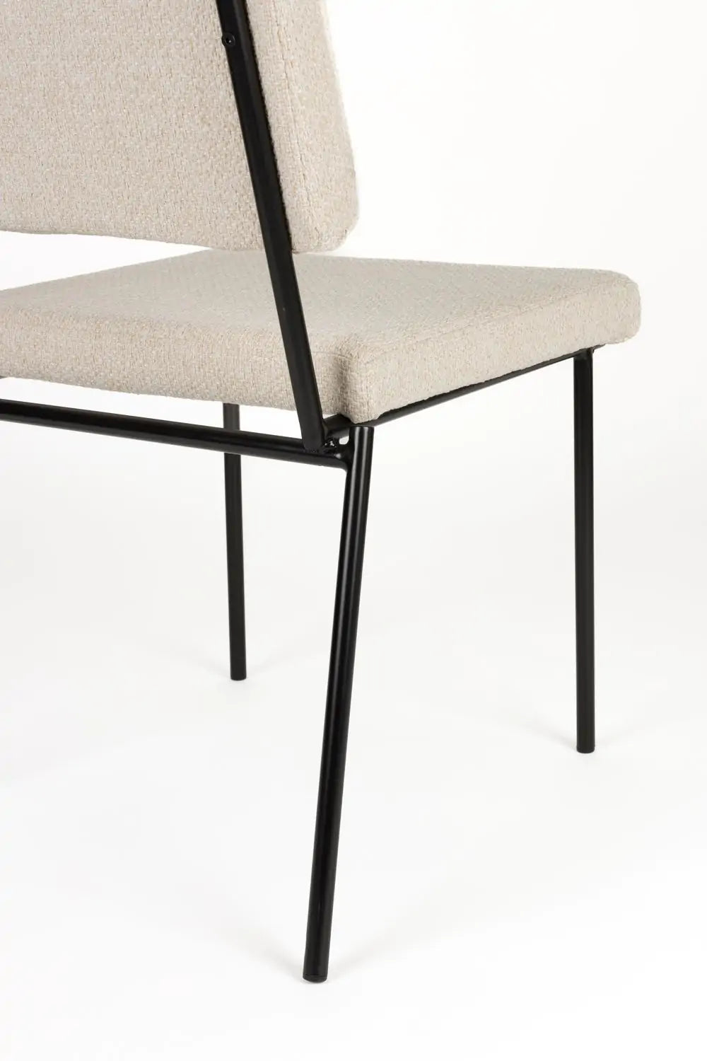 Fellow beige chair with a black base