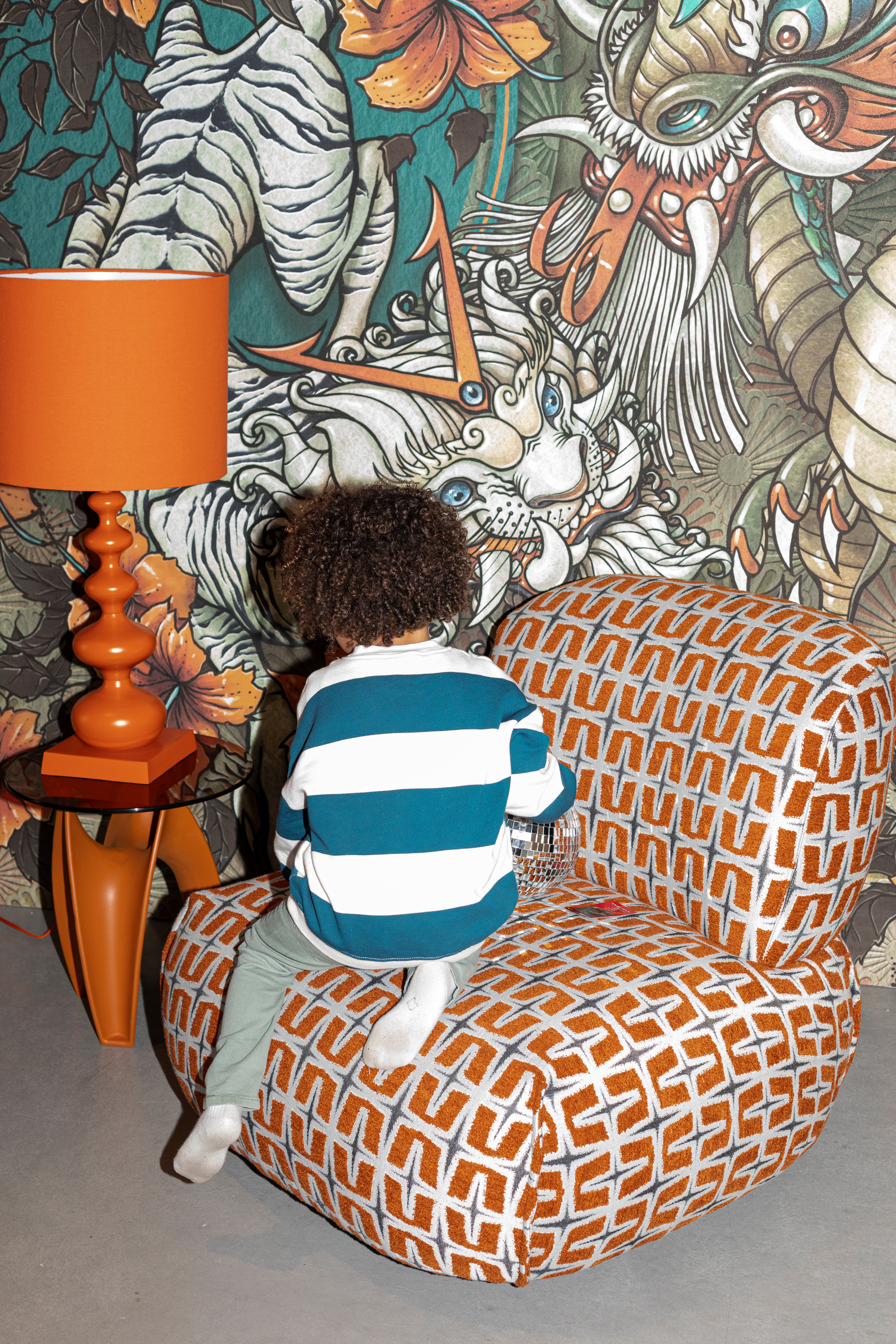 RITZ armchair in orange with geometric pattern