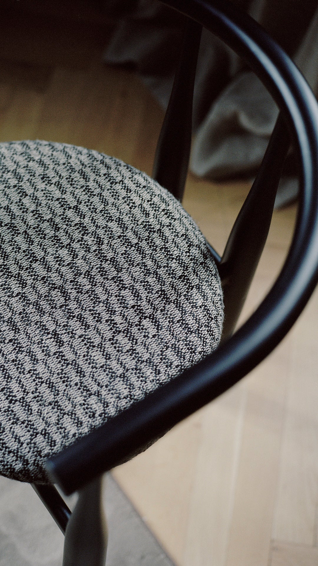 Bukowski chair upholstered with a black beech base