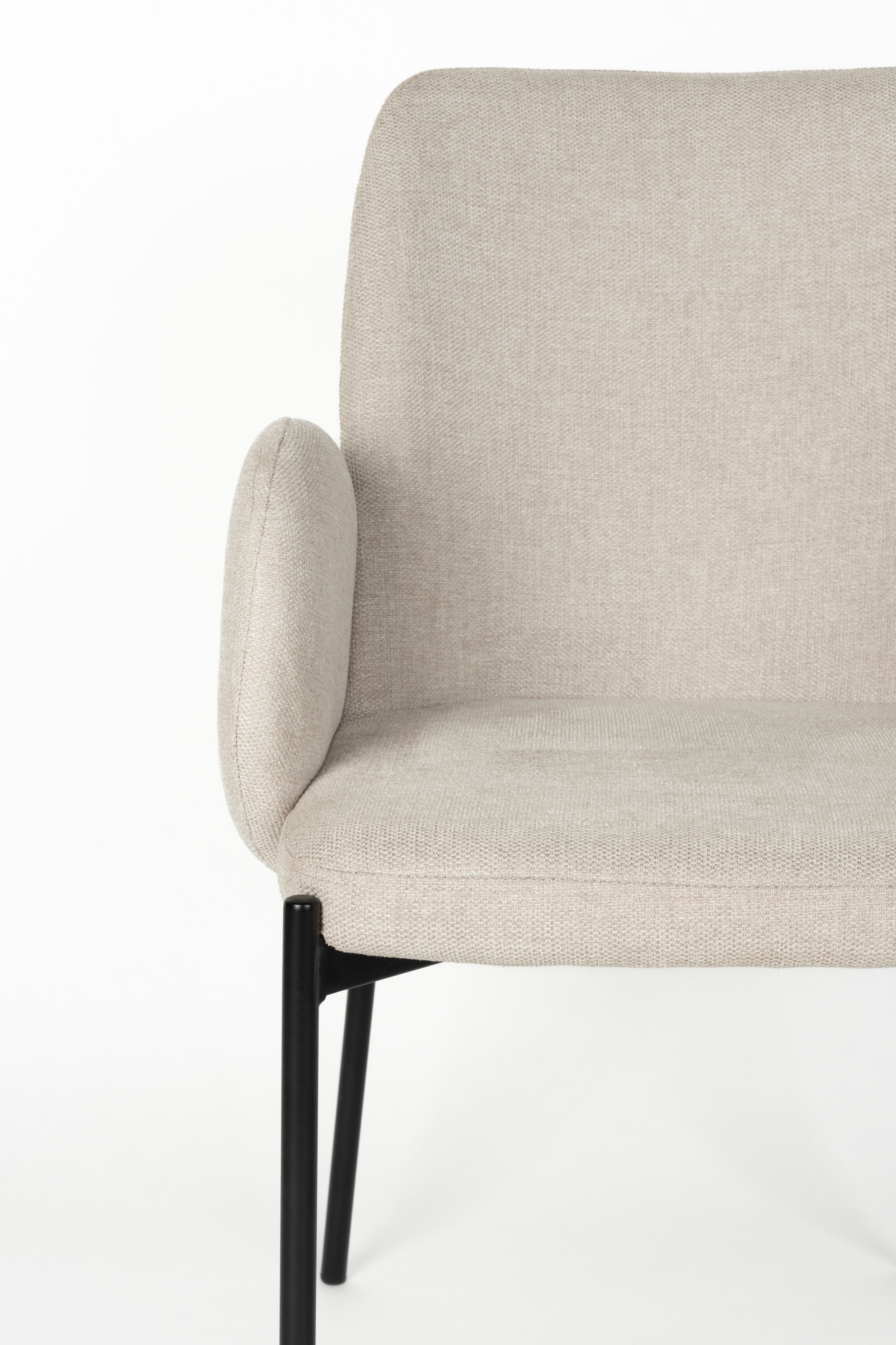 Chair with armrests, i.e. a creamy