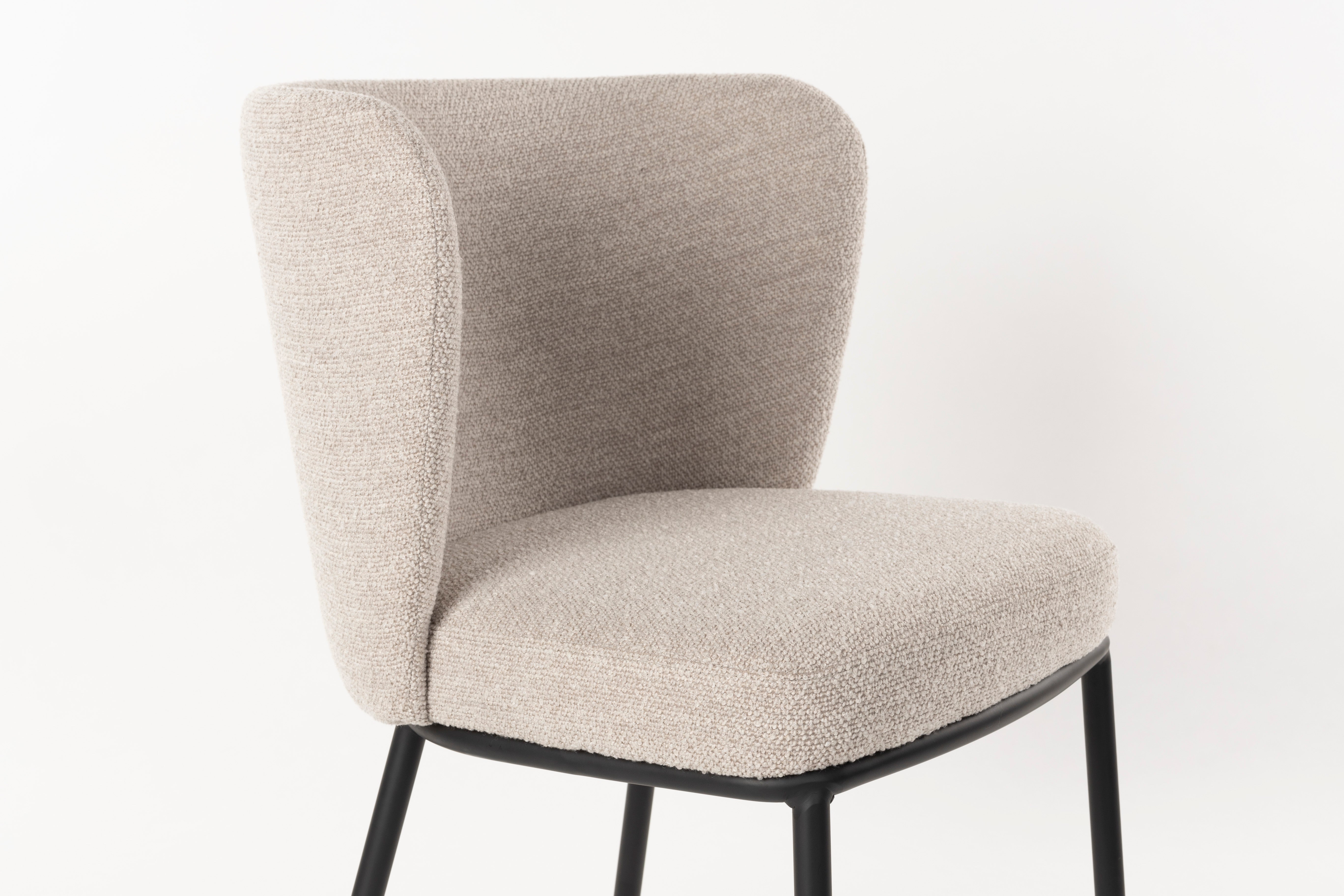 Black beige guus chair with a black base