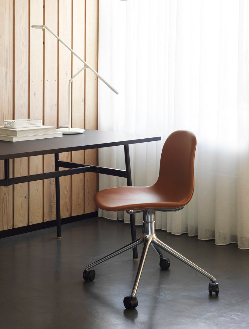 4W Blue Form Office chair with an aluminum base on wheels