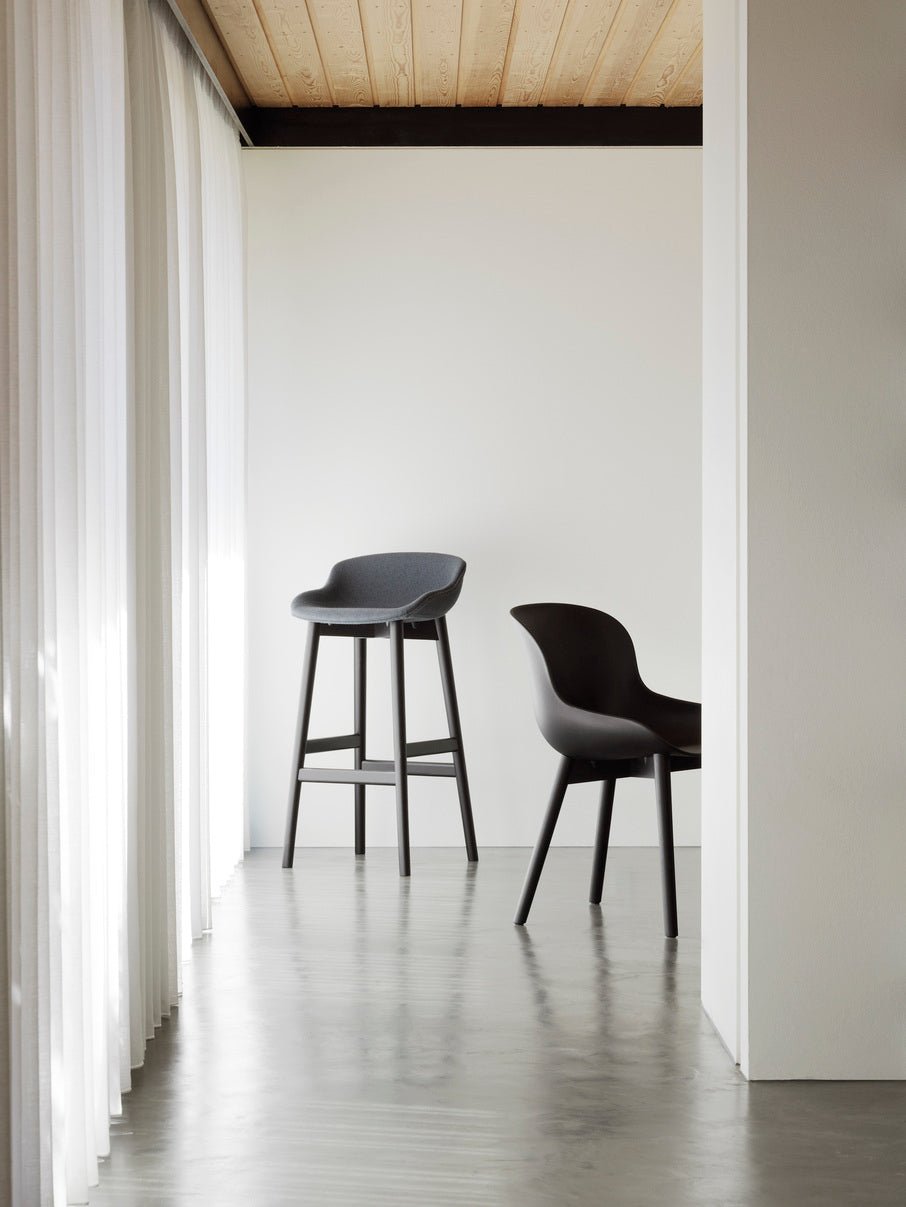 Hyg black chair with a black oak base