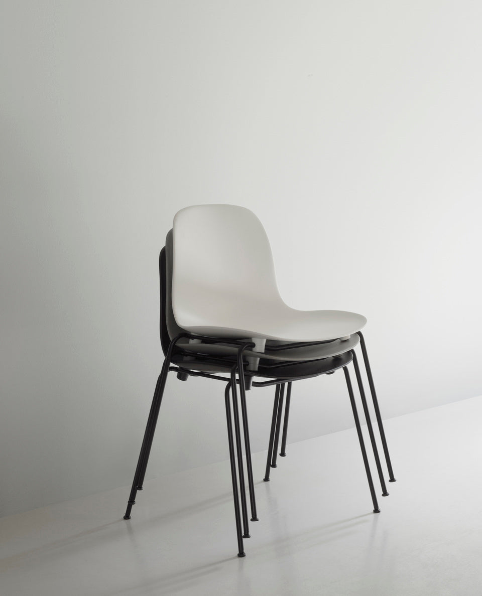 A chair of forms of black stacking with a black base