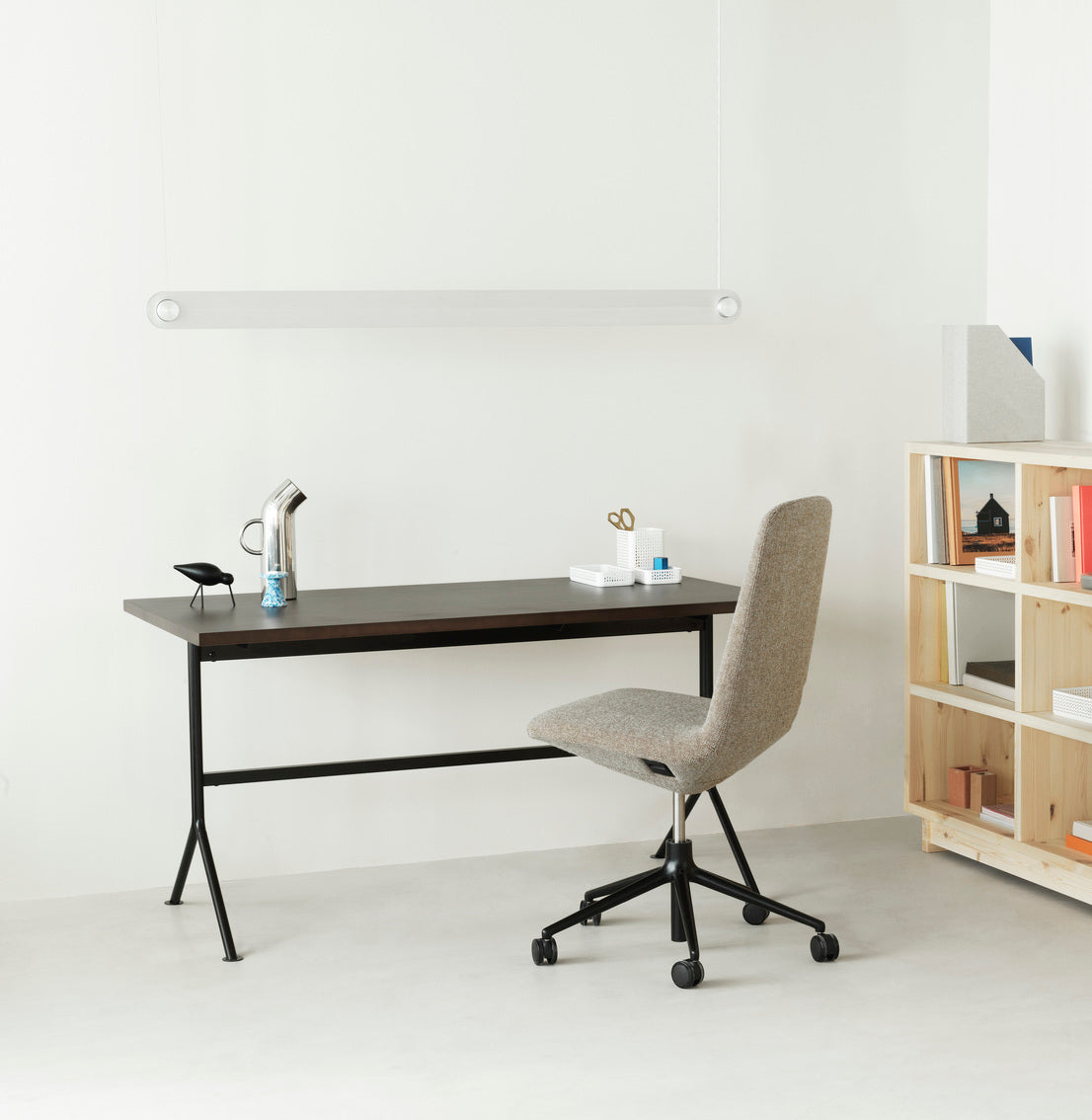 Kip desk, a natural pine with a black base