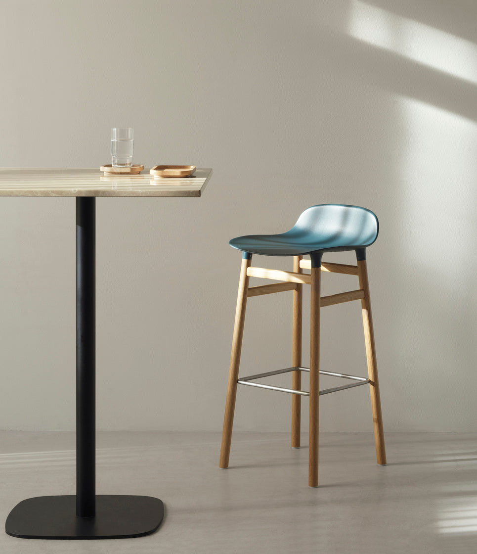 Hocker forms red with a black oak base