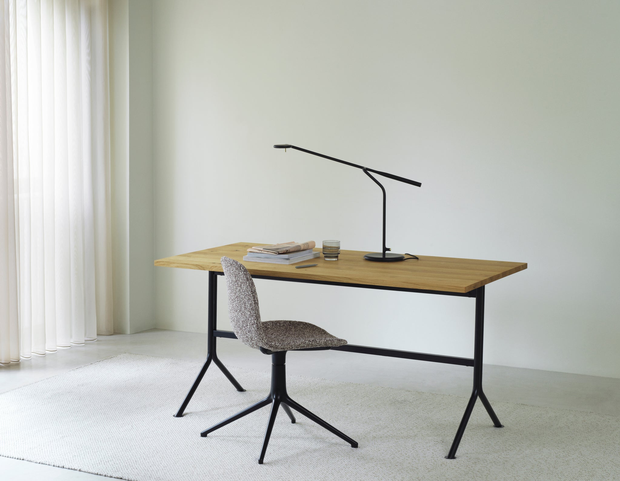 Kip desk, a natural pine with a black base