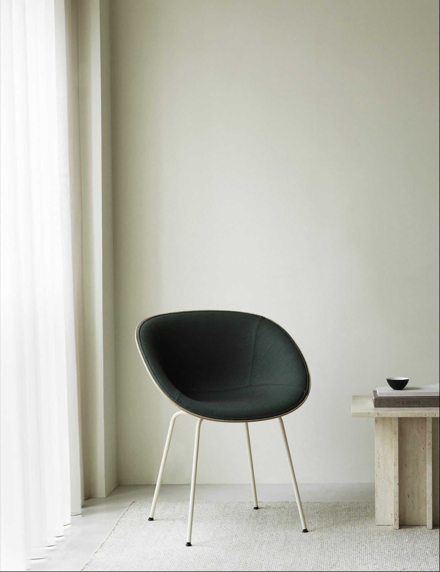 A chair upholstered mats with a black base