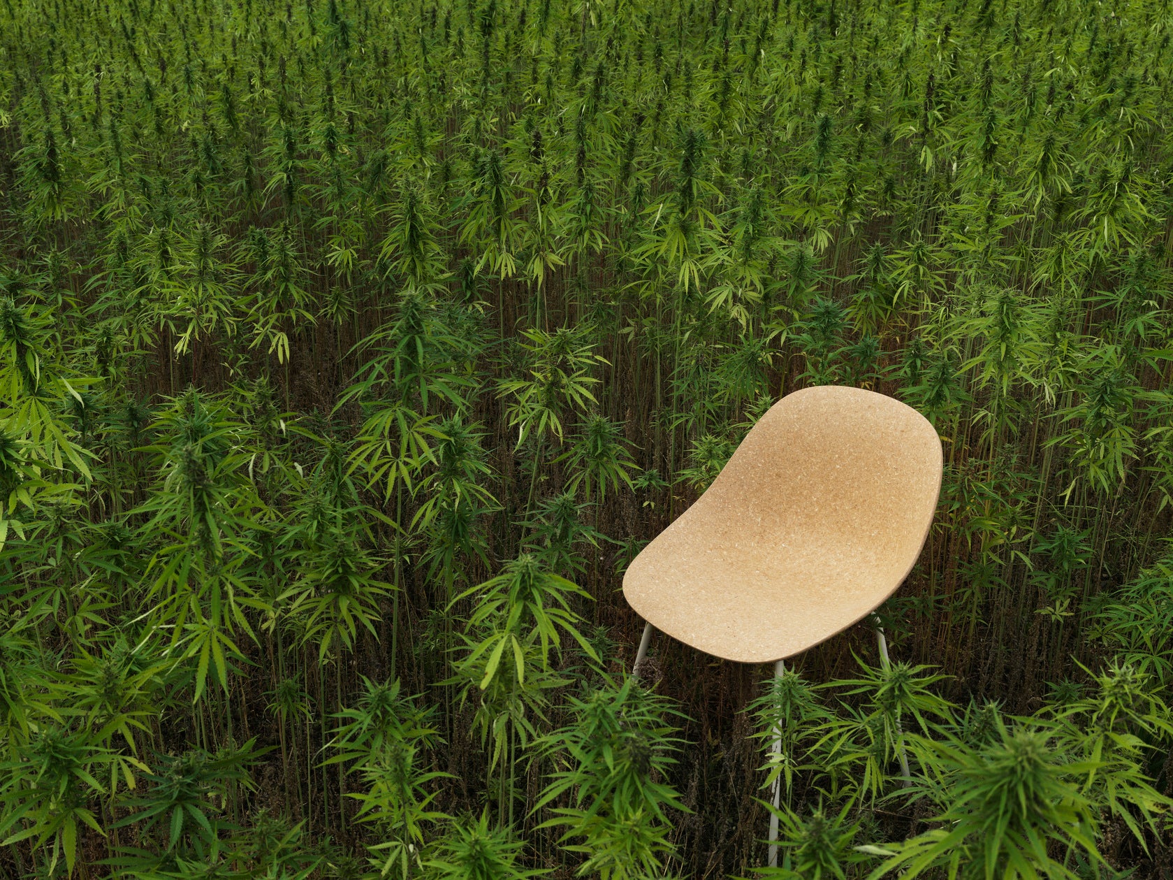A beige mat chair with a black base