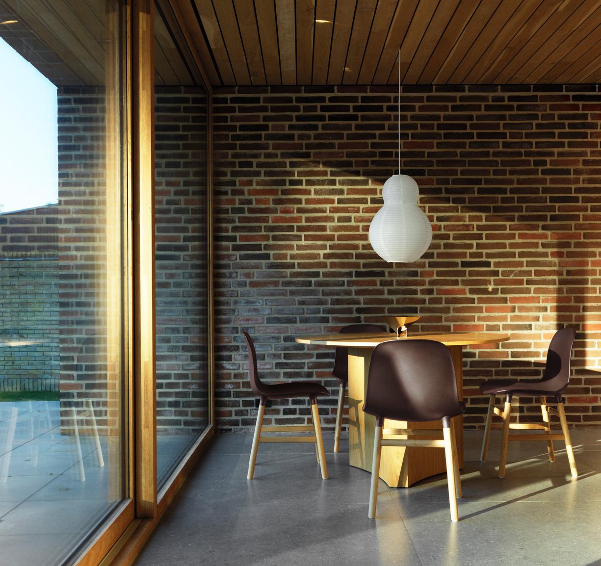 Chair of Form White with an oak base
