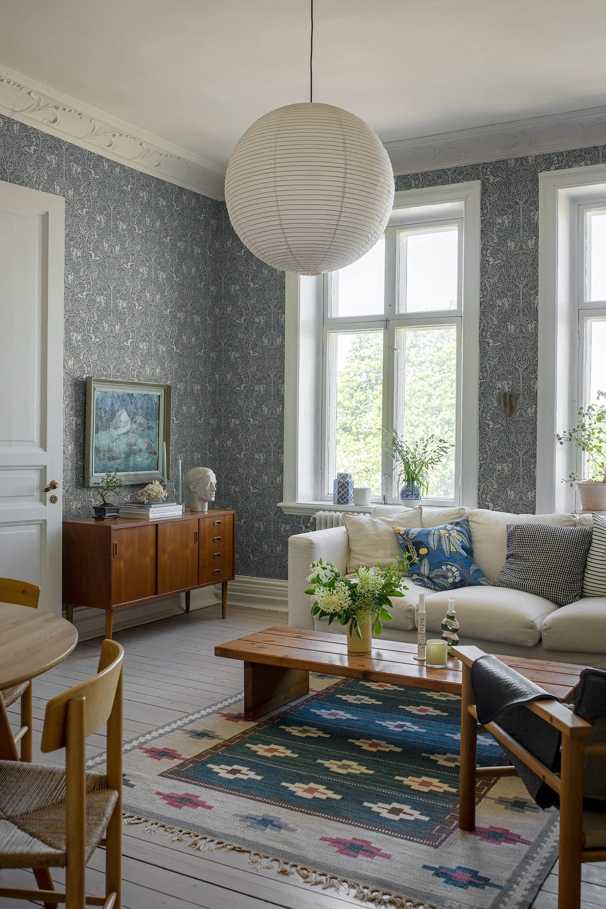 Wallpaper with a botanical pattern and forest theme UNDER THE ELDER TREE navy blue with white