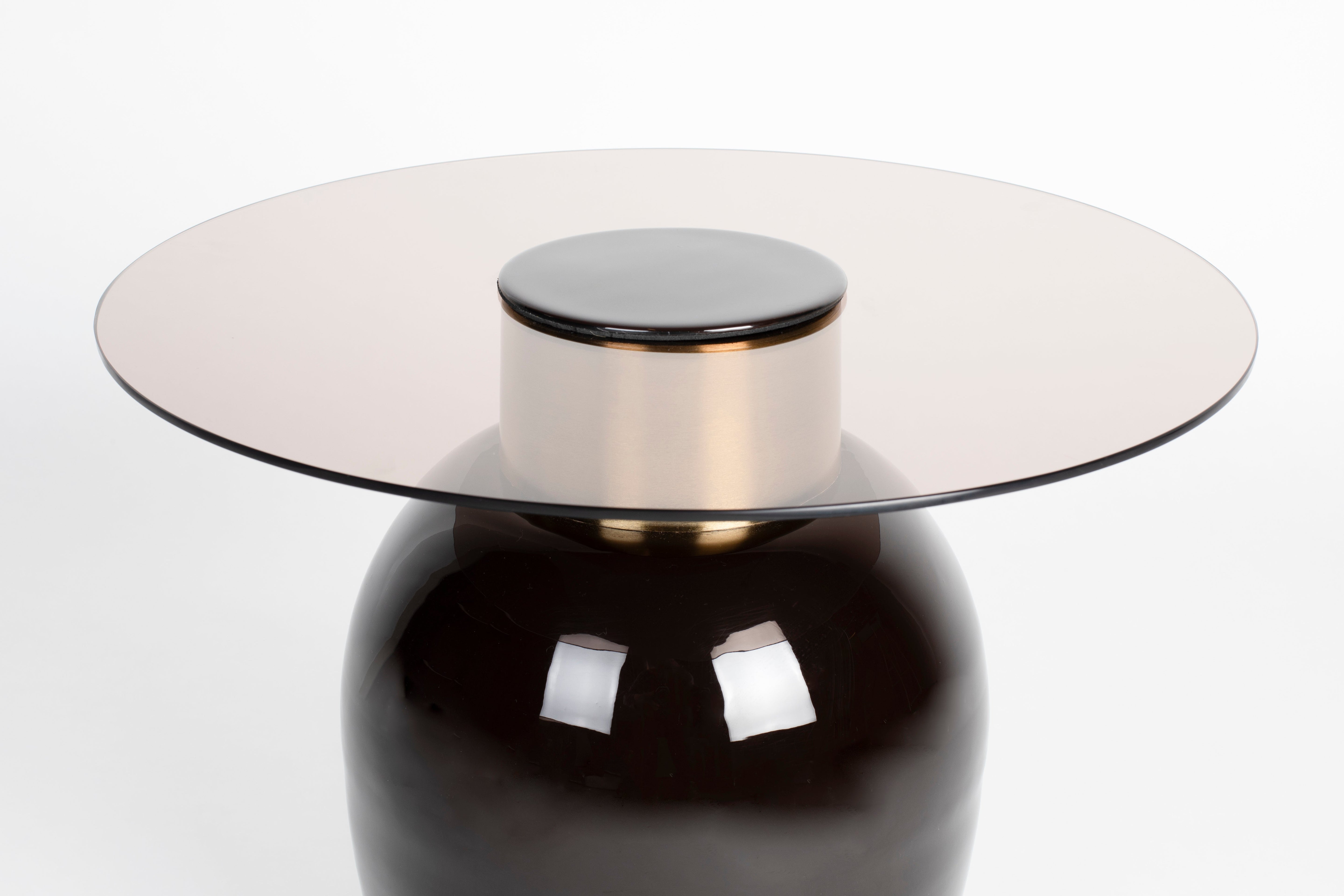 Mohr's brown table with a glass top