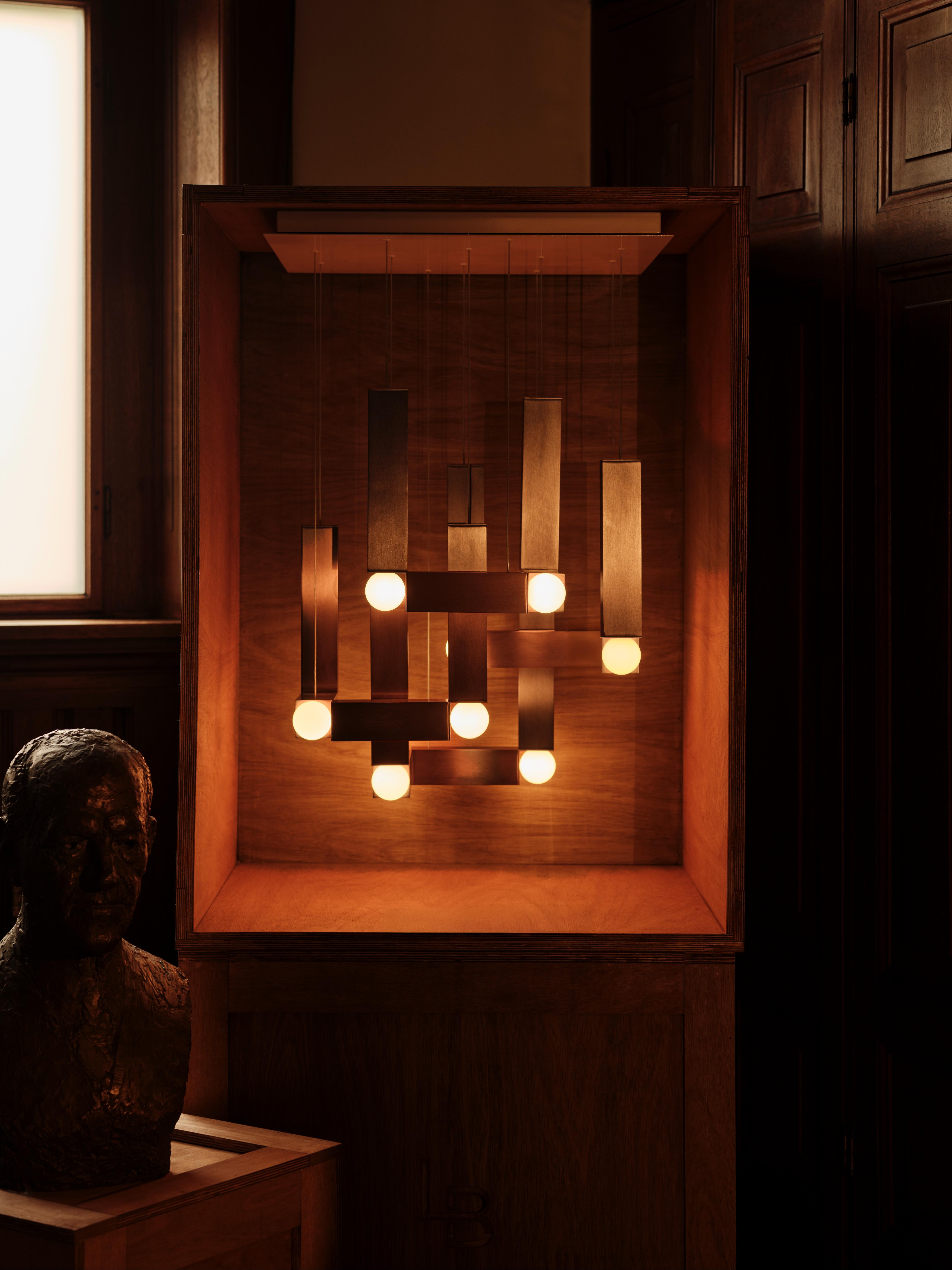 VESPER DUO pendant lamp with an opal shade and brown finish.