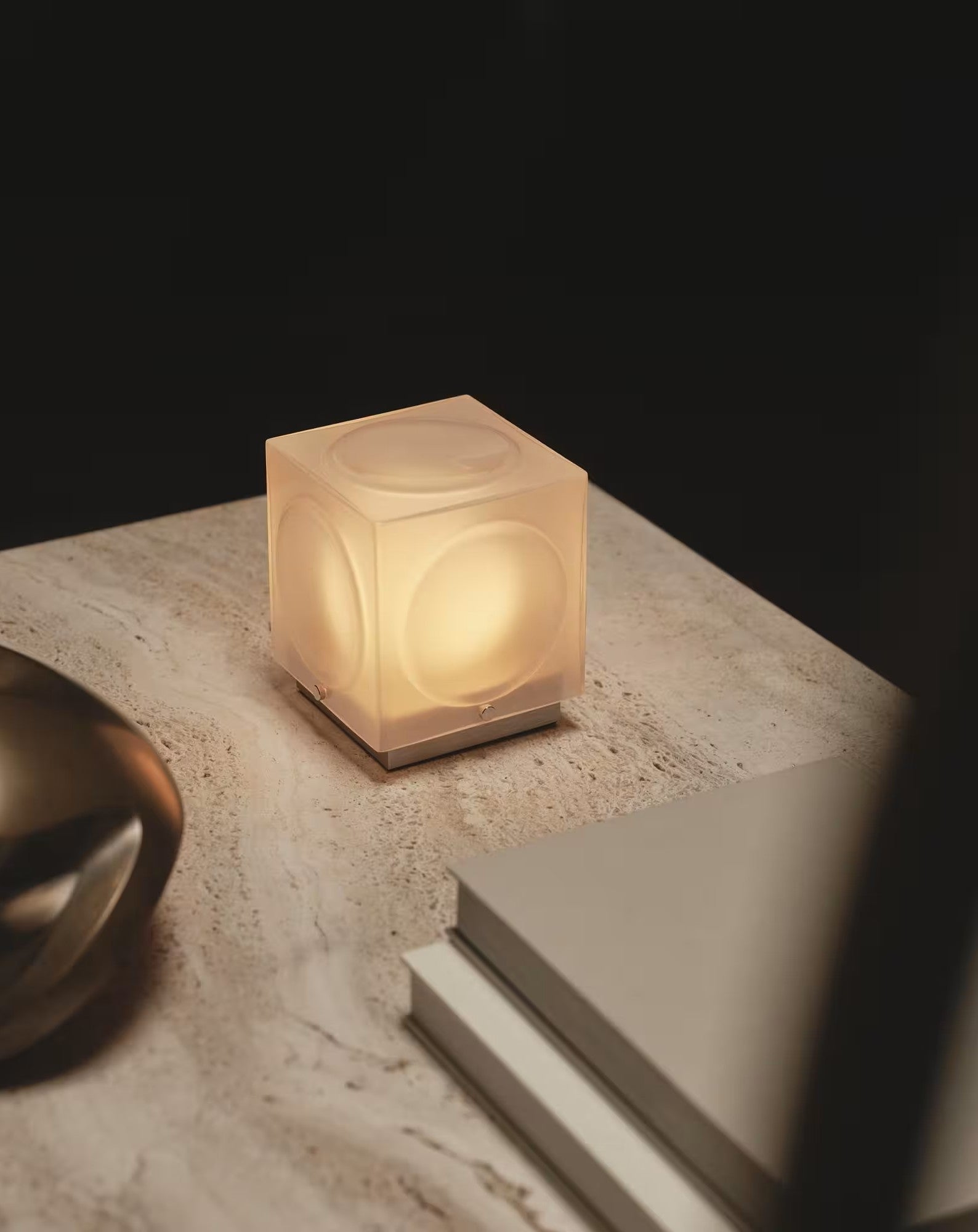 CHANT portable lamp with a matte shade and a gold base.