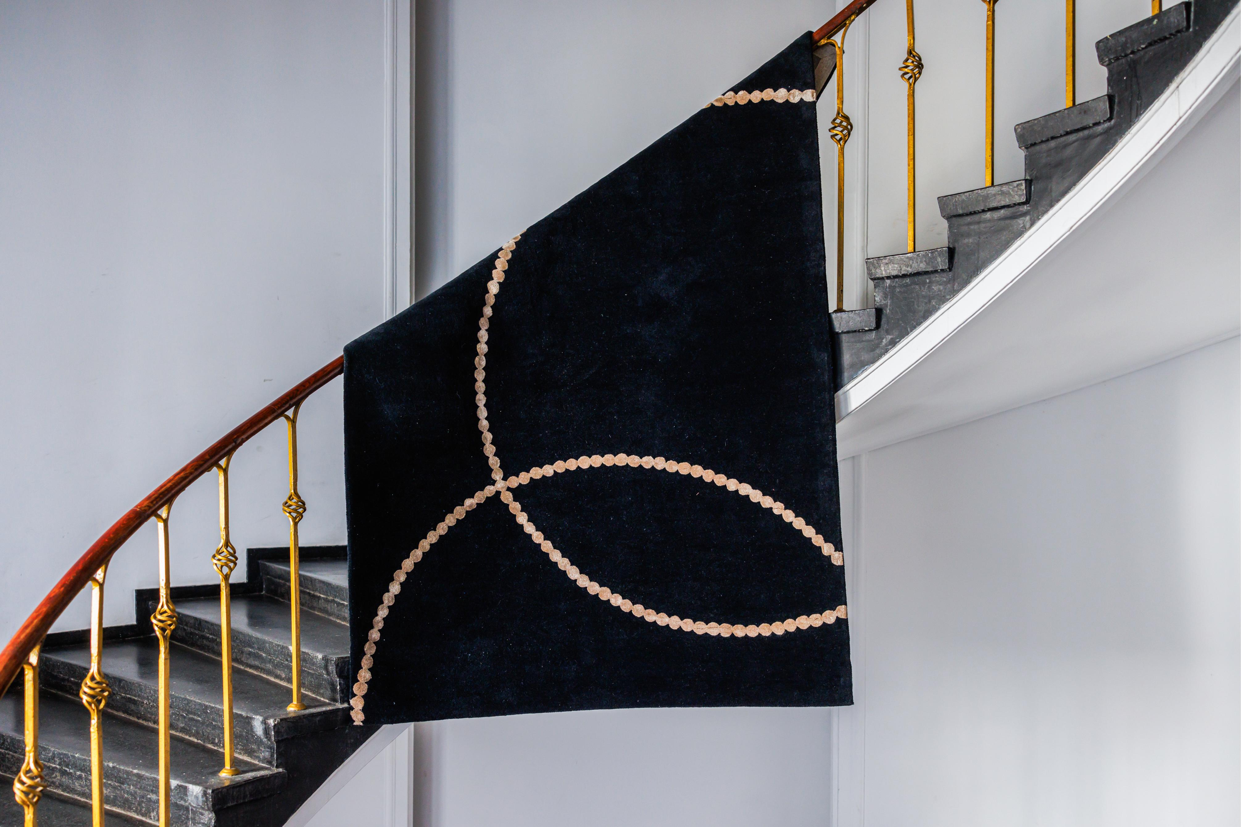 Teppich LUNA schwarz mit beigem Muster