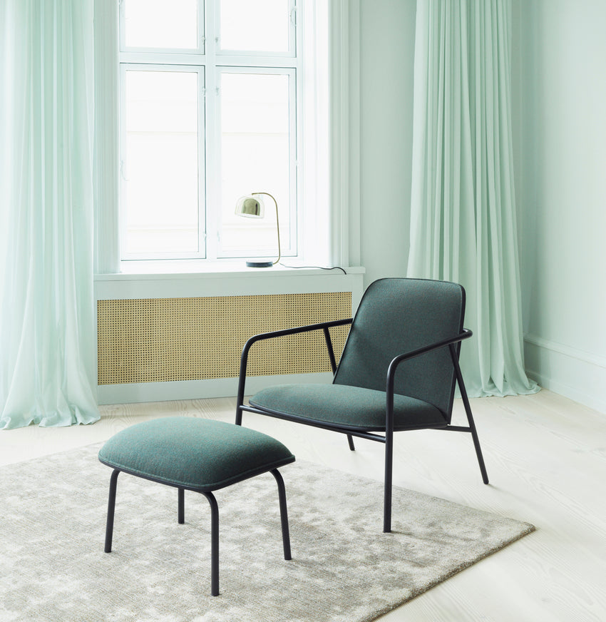 Upholstered armchair pad low black ash veneer with black base