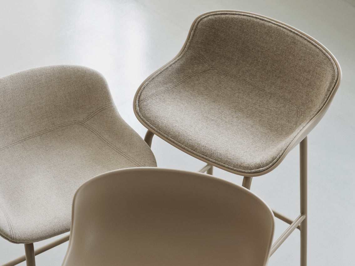Hyg upholstered bar chair with a white base