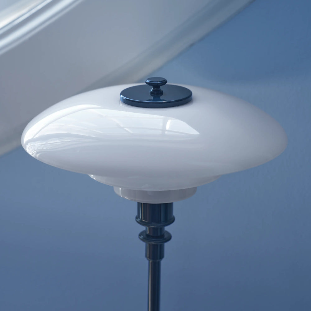 PH 2/1 table lamp in white with a navy blue base