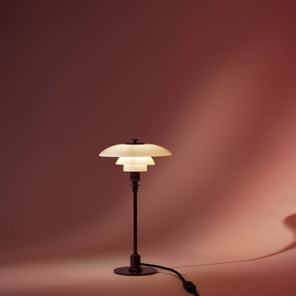 PH 2/1 table lamp in white with a burgundy base