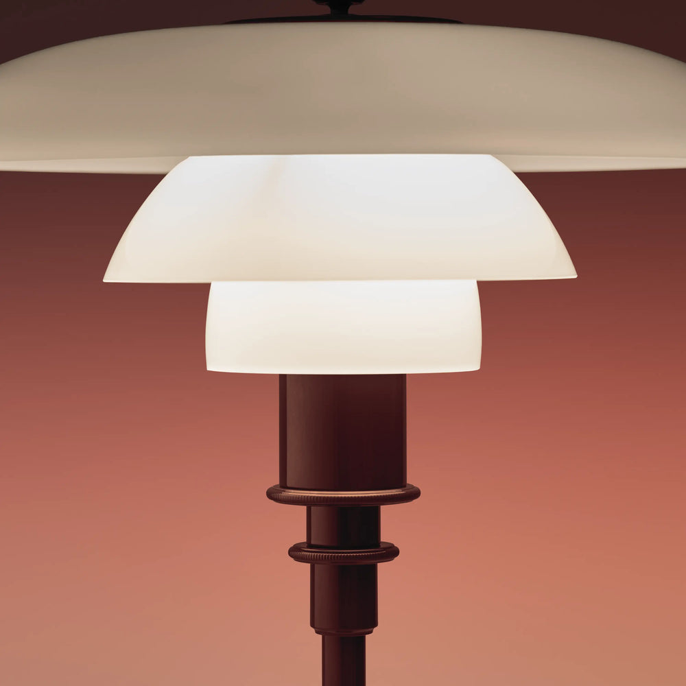 PH 2/1 table lamp in white with a burgundy base