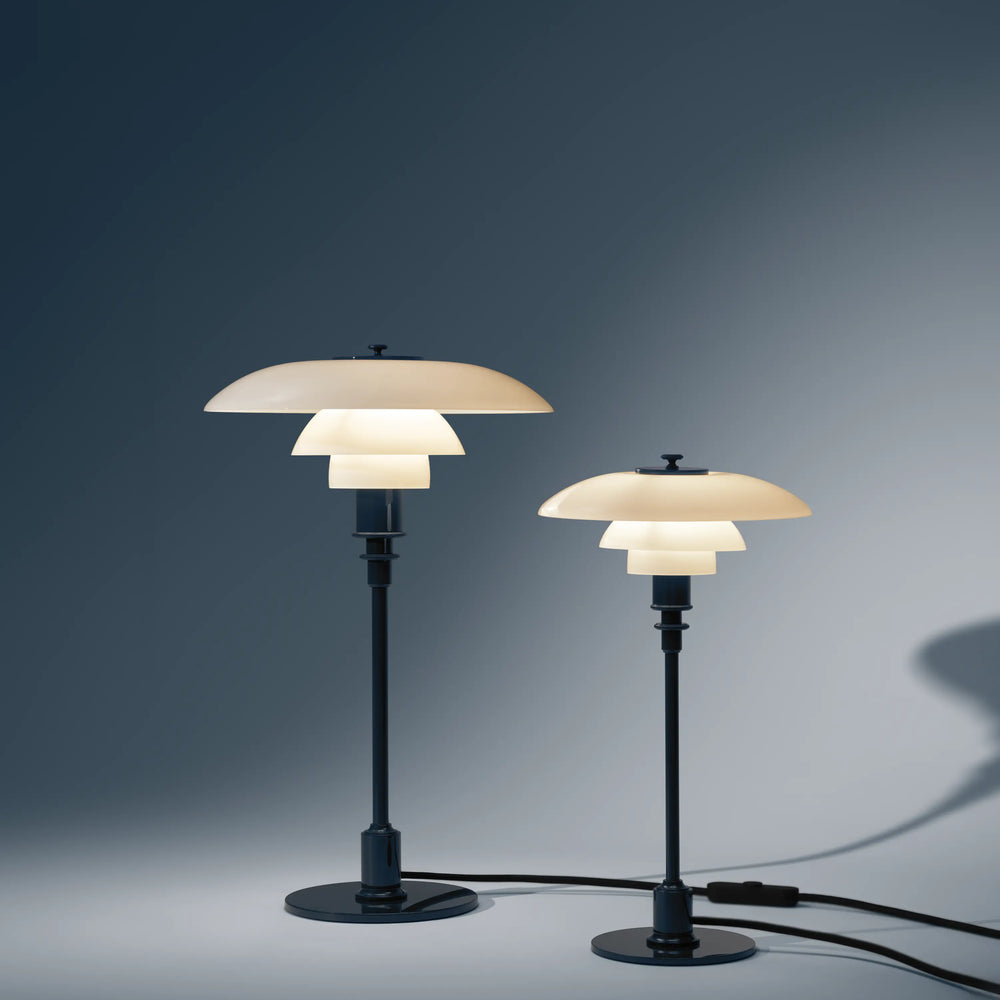 PH 2/1 table lamp in white with a navy blue base