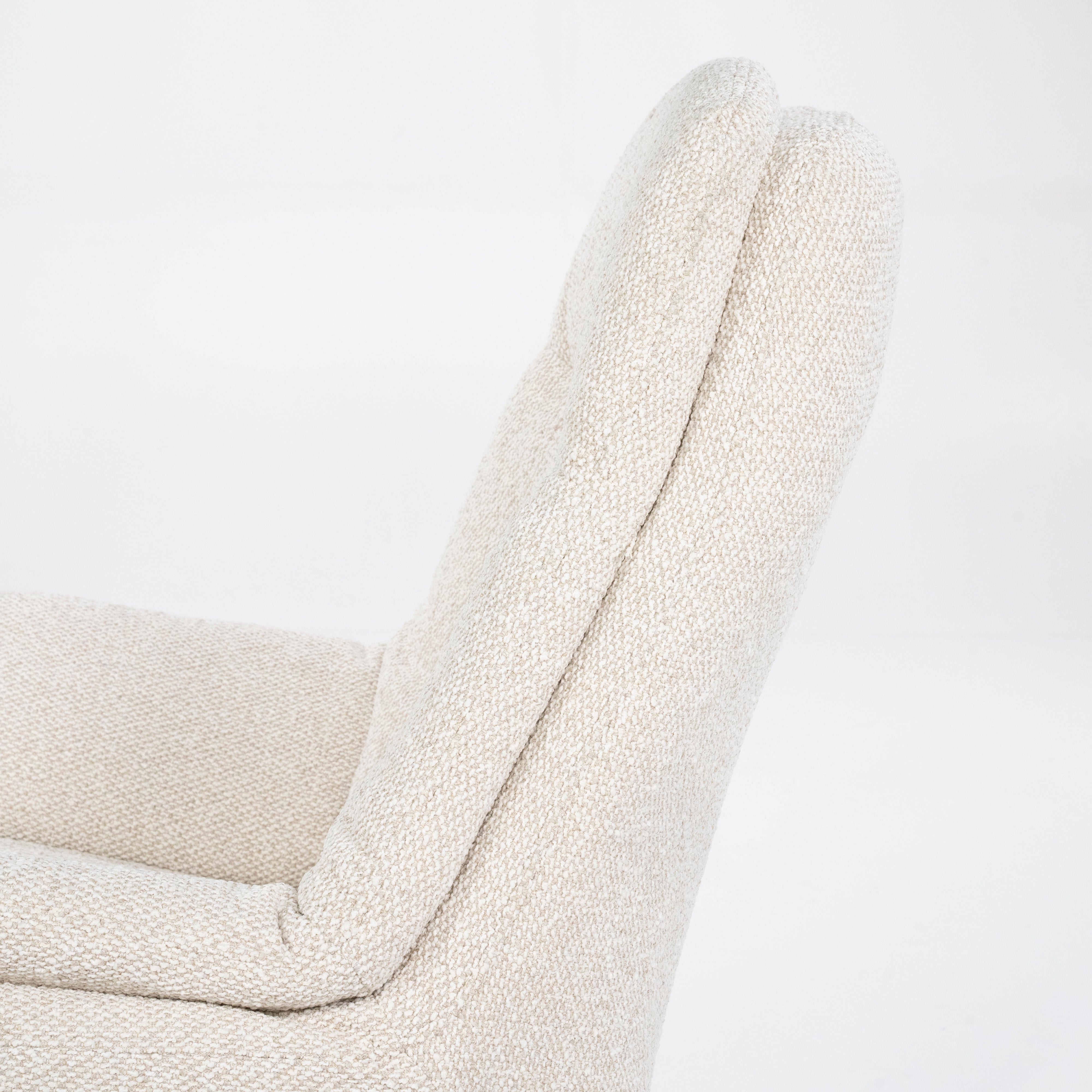 CALEB beige armchair with black base and footrest
