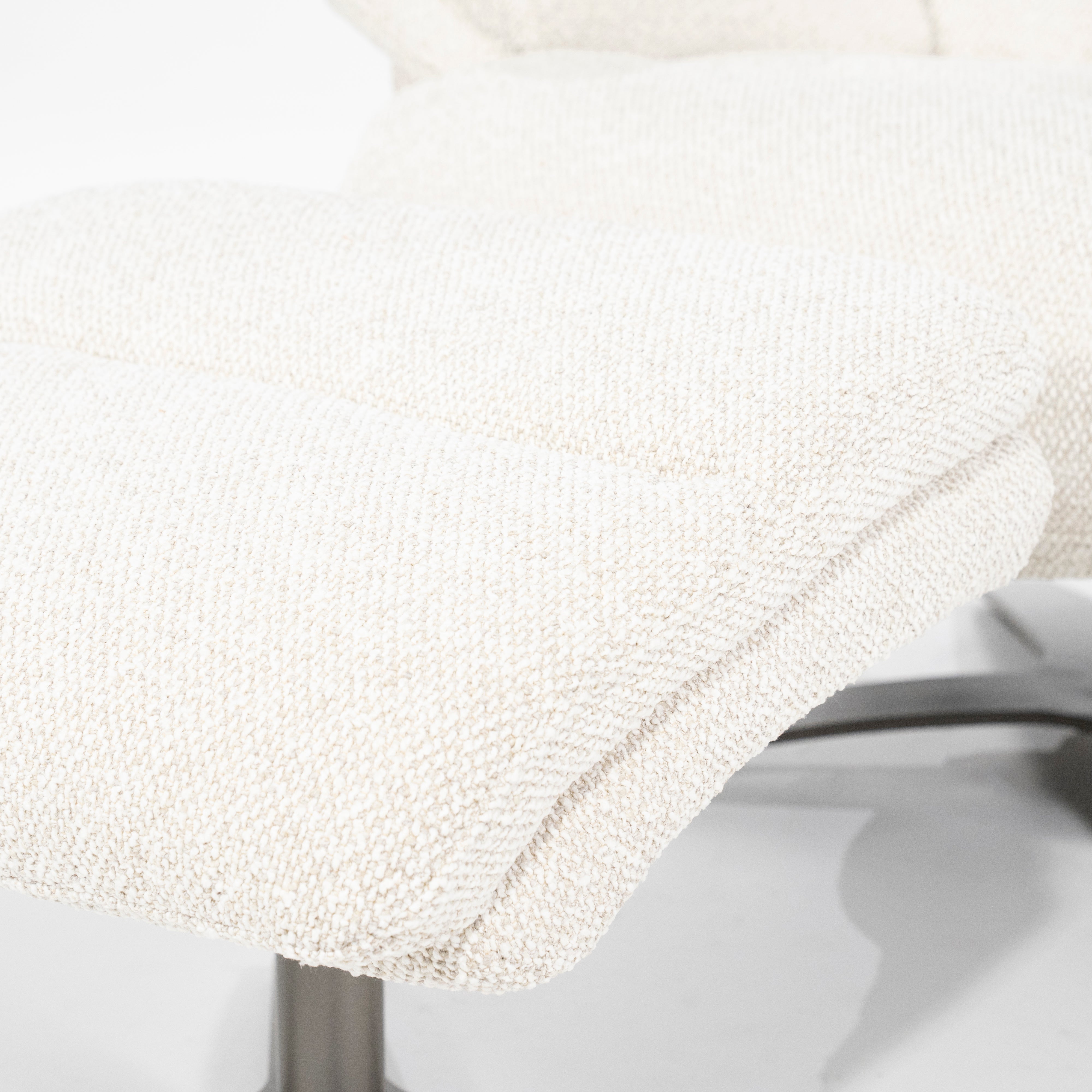 CALEB beige armchair with black base and footrest