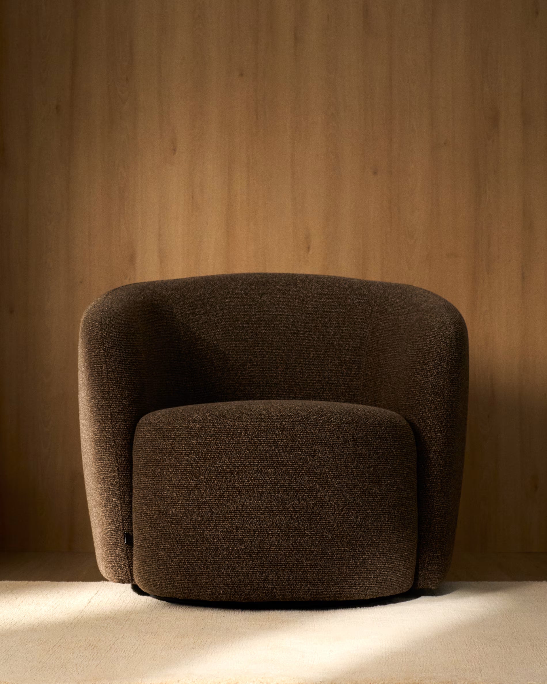 ODENIA swivel armchair in brown boucle